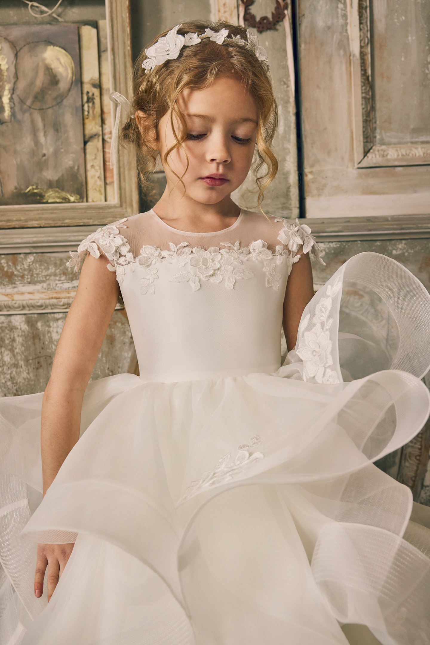 Fable by Justin Alexander Style FG015 Norah Organza Tea Length Ball Gown with Illusion Neckline, Floral Lace Appliqués, and Ruffled Layered Skirt