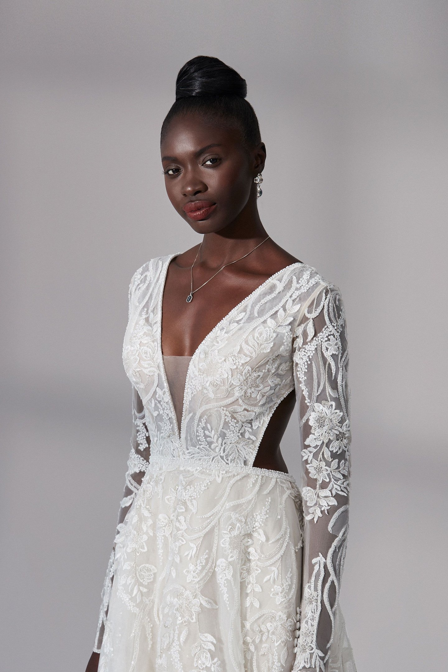 Justin Alexander Signature Style 99186 Higgins Plunging V-Neck A-Line Gown with Side Cutouts and Keyhole Back
