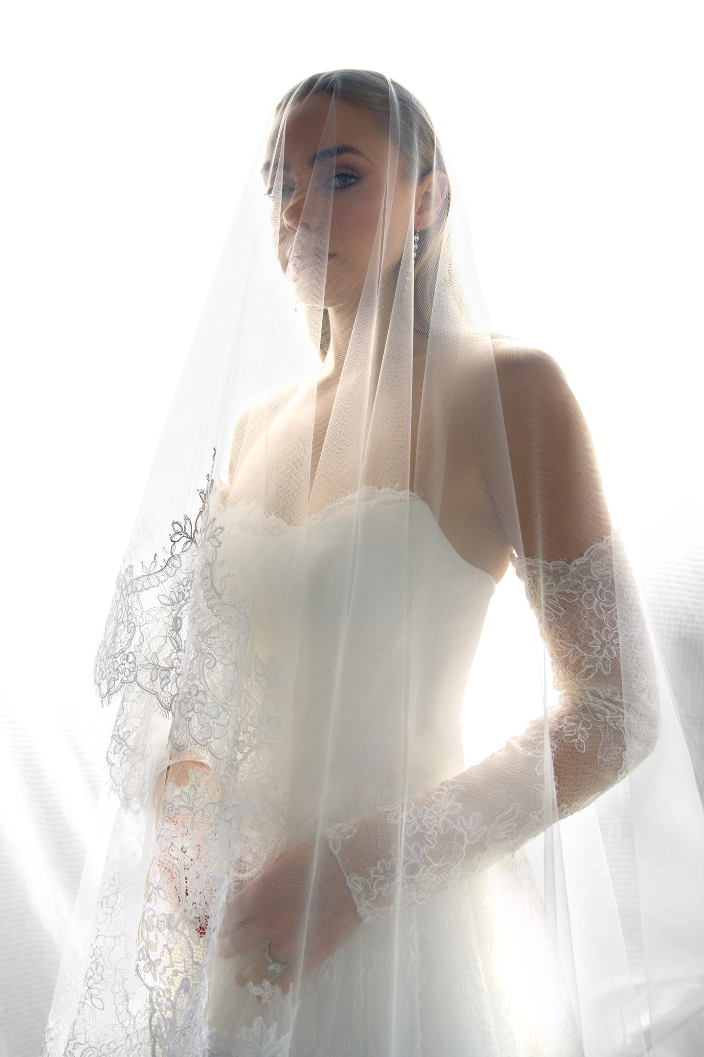 Justin Alexander Signature Style 99389 SABLE Alençon Lace Ball Gown with Satin Bodice and Peek-a-Boo Neckline