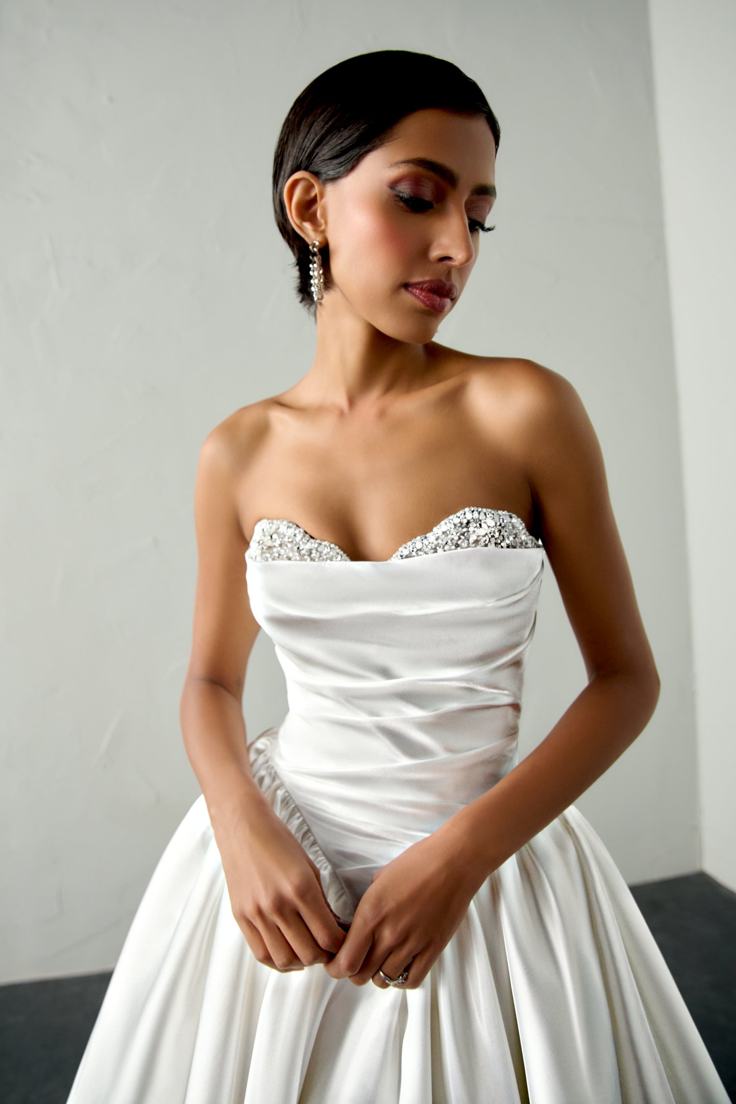 Justin Alexander Signature Style 99398 ECHO Liquid Satin Ball Gown with Crystal Peek-a-Boo Neckline