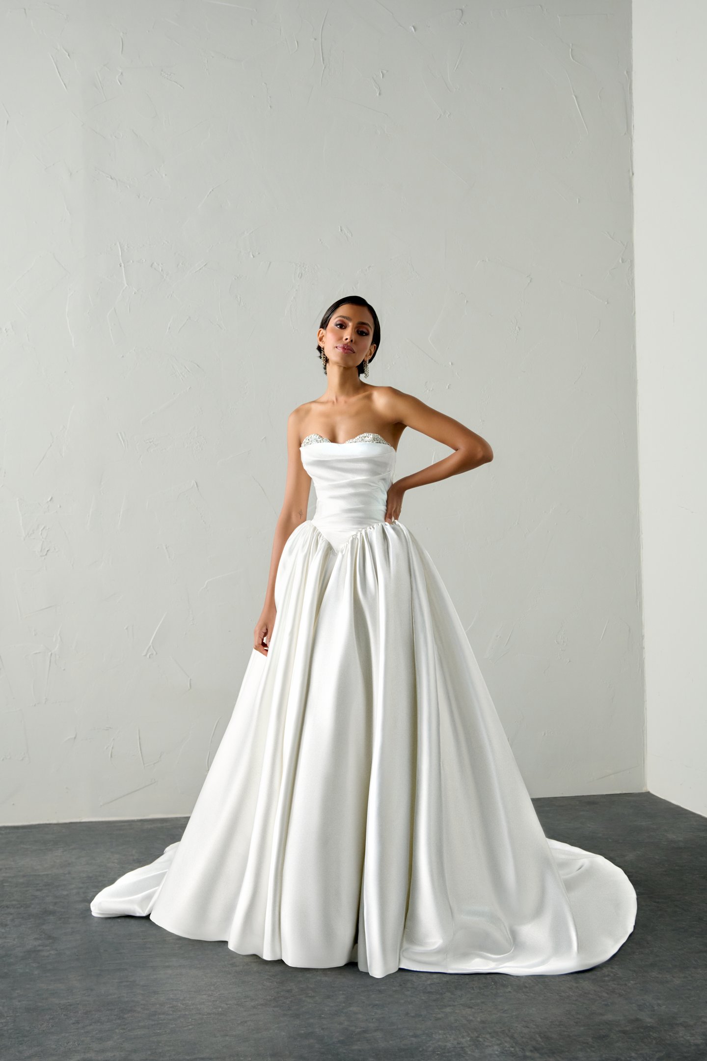 Justin Alexander Signature Style 99398 ECHO Liquid Satin Ball Gown with Crystal Peek-a-Boo Neckline