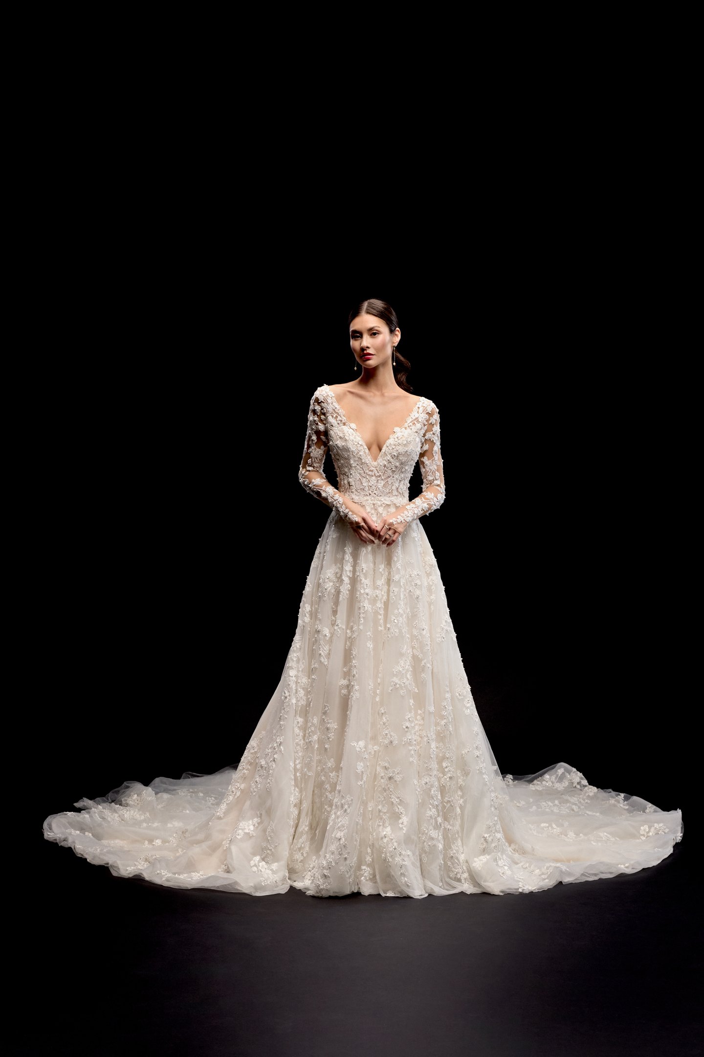 Justin Alexander Signature Style 99289 Celsa Long Sleeve A-Line Gown with Sheer Bodice and Deep V-Neckline