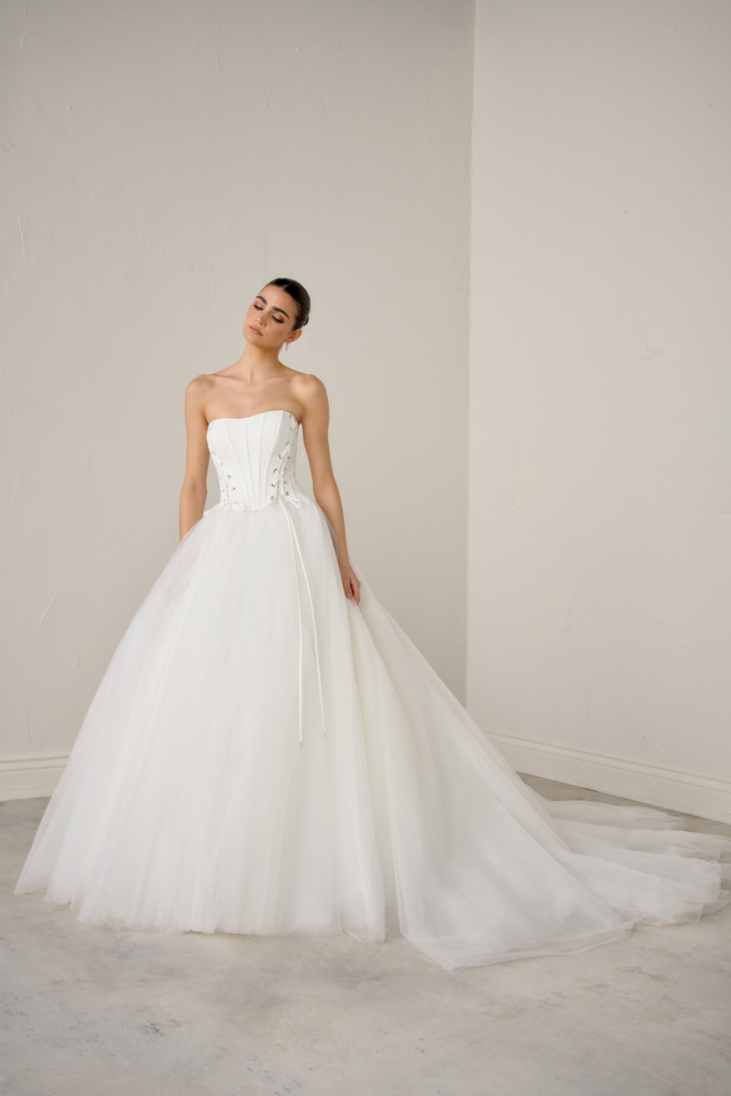 Justin Alexander Signature Style 99356 LYNX Basque Waist Tulle Ball Gown with Front Corset Ties