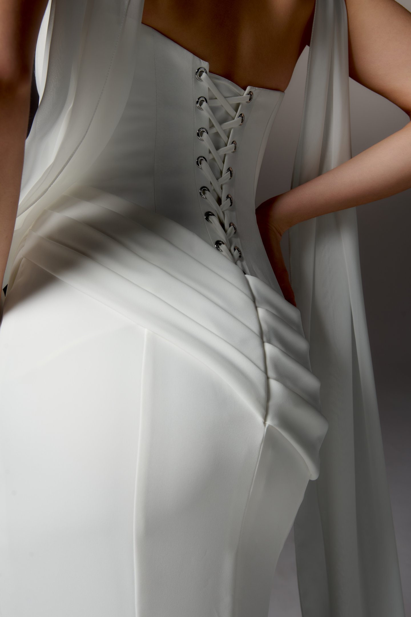 Justin Alexander Signature Style 99413 LUCIDA Clean Silky Crepe Fit and Flare Gown with Strapless Arched Neckline and Asymmetrical Waistline