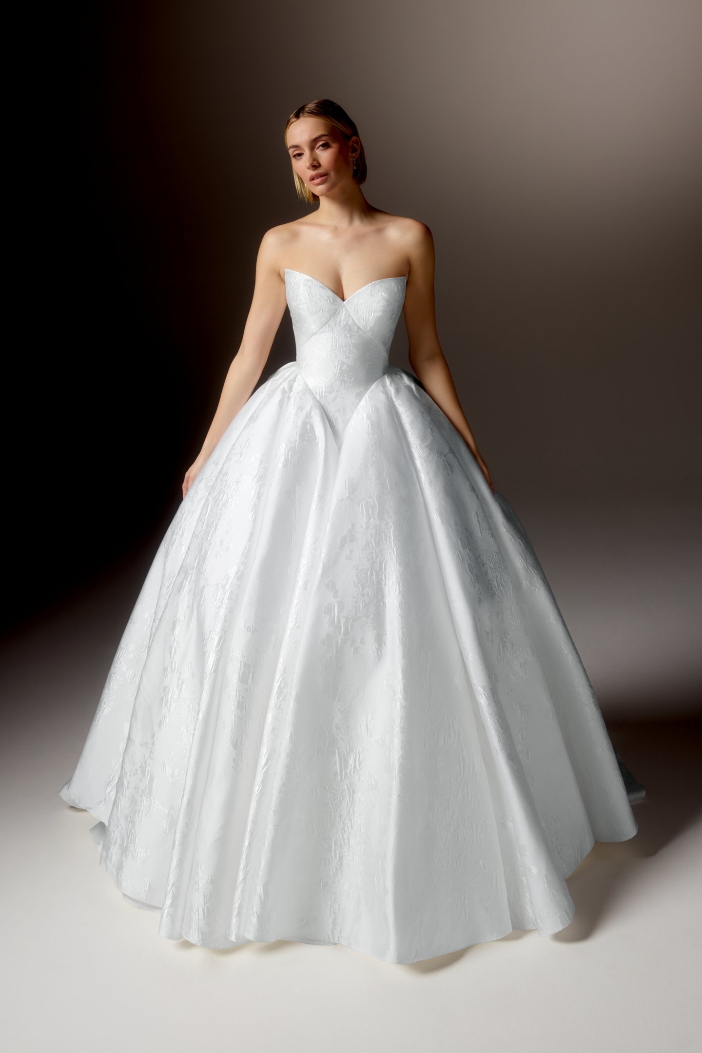 Justin Alexander Signature Style 99416 PALAZZO Brocade Ball Gown with Strapless Sweetheart Neckline, Dramatic Basque Waistline, and Hip Puffs