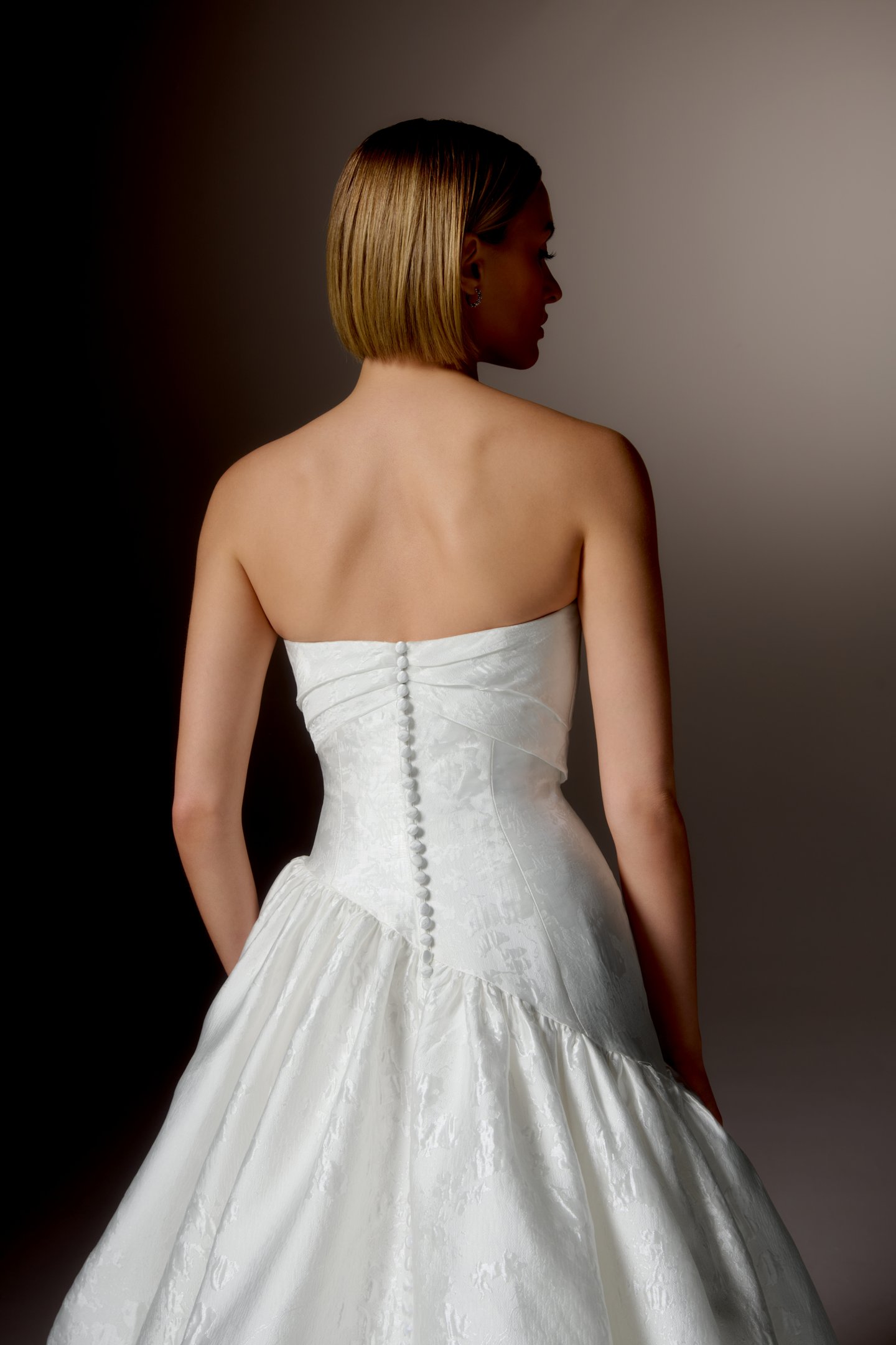 Justin Alexander Signature Style 99418 CARAVELLA Brocade Ball Gown with Strapless Cuff Neckline, Asymmetrical Waistline, and Dramatic Gathered Skirt