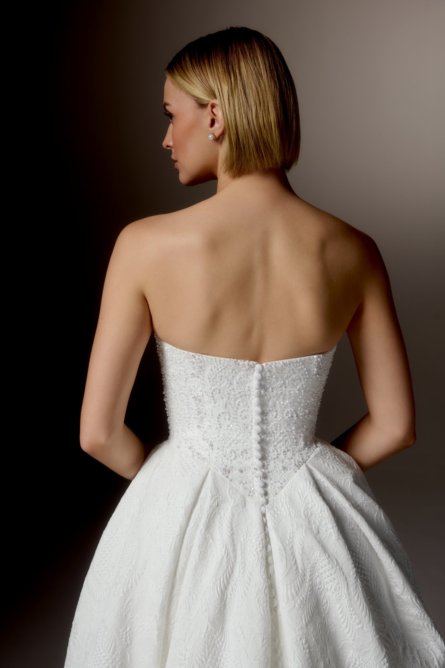 Justin Alexander Signature Style 99424 OMBRETTA Textured Brocade Ball Gown with Cat Eye Neckline, Beaded Bodice, and Basque Waistline