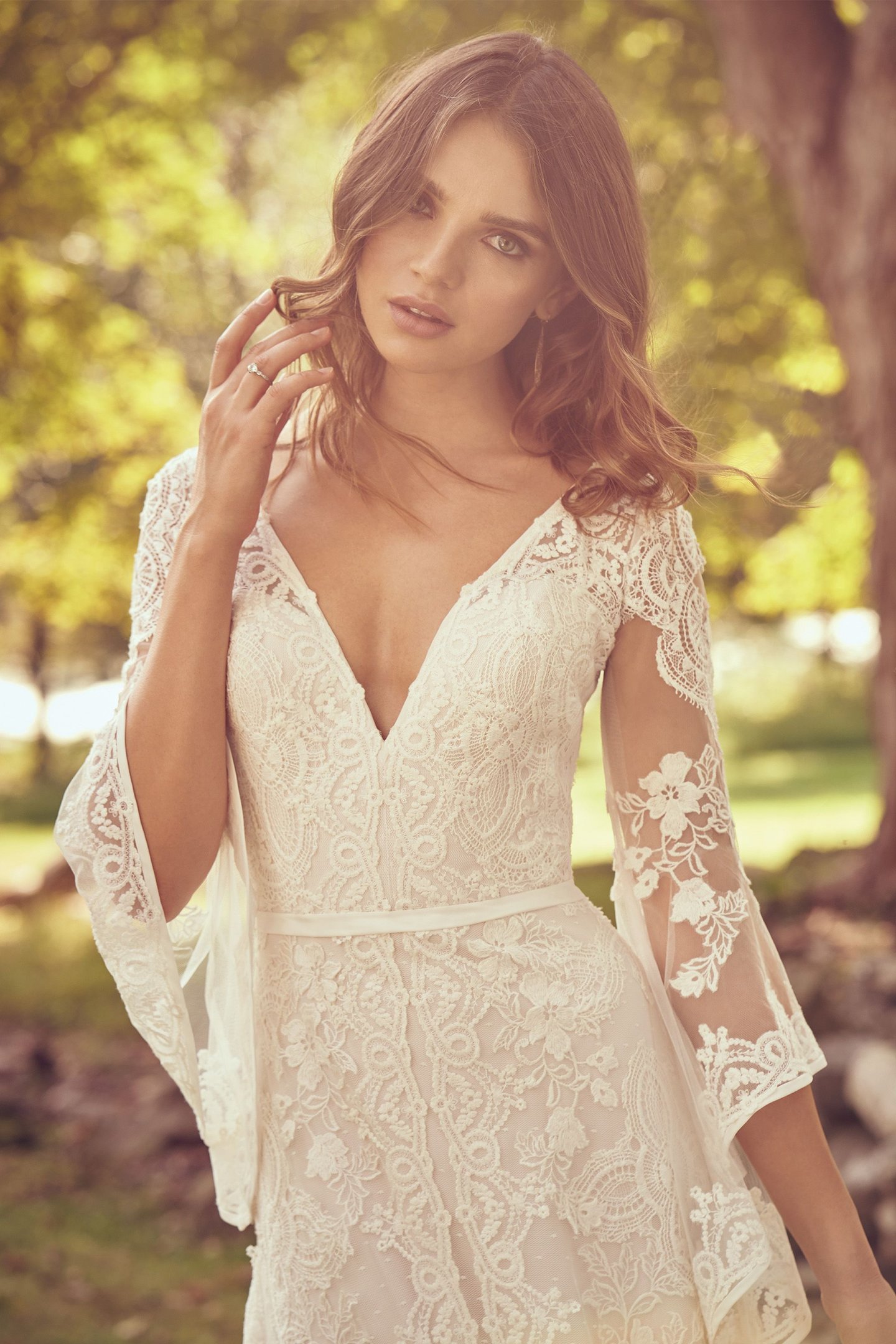 Lillian West Style 66064 Bell Sleeve Lace Dress with Criss-Cross Back Detail