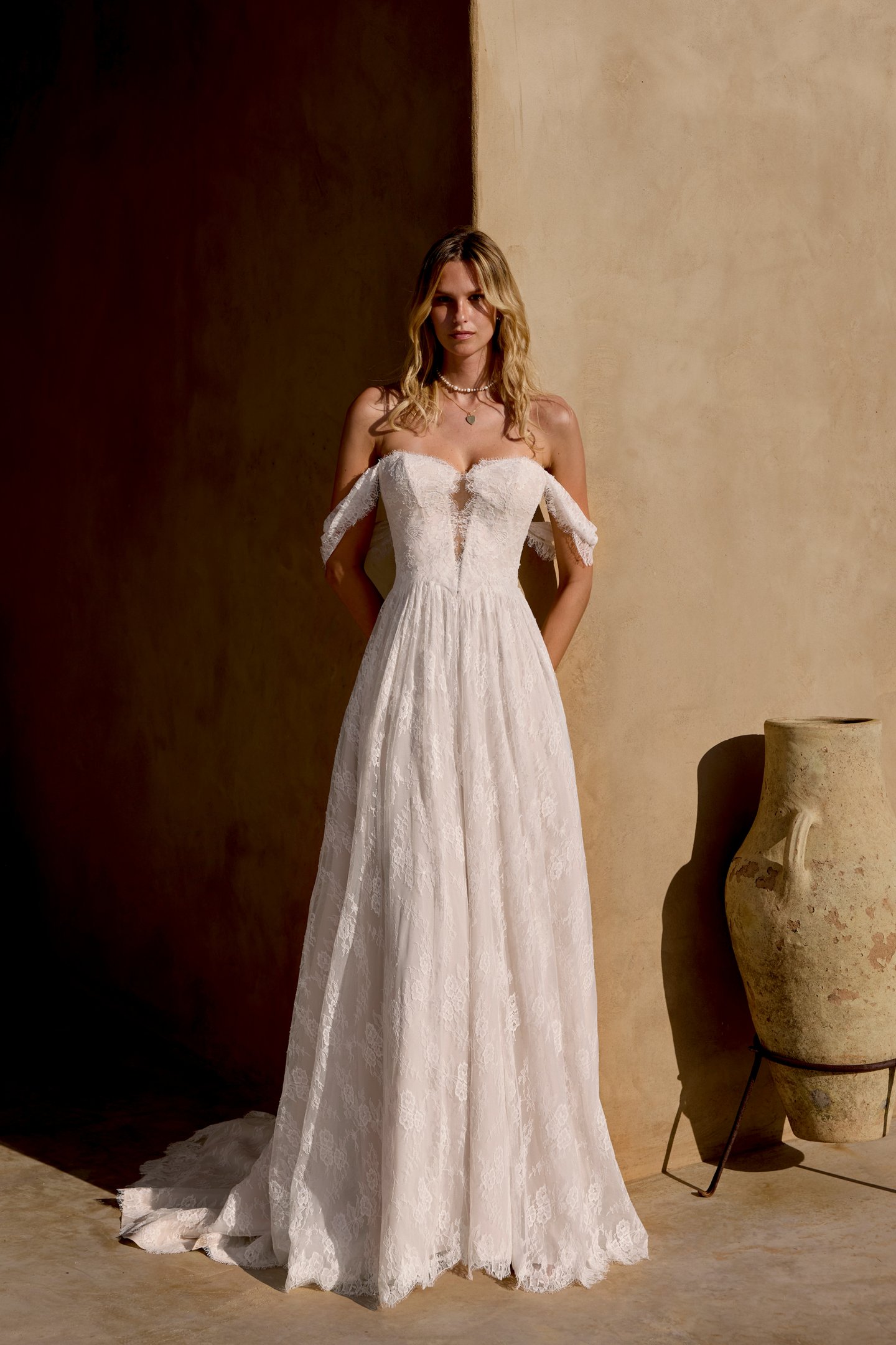 Lillian West Style 66459 Allover Matte Lace A-Line Gown with Plunging Neckline and Basque Waist