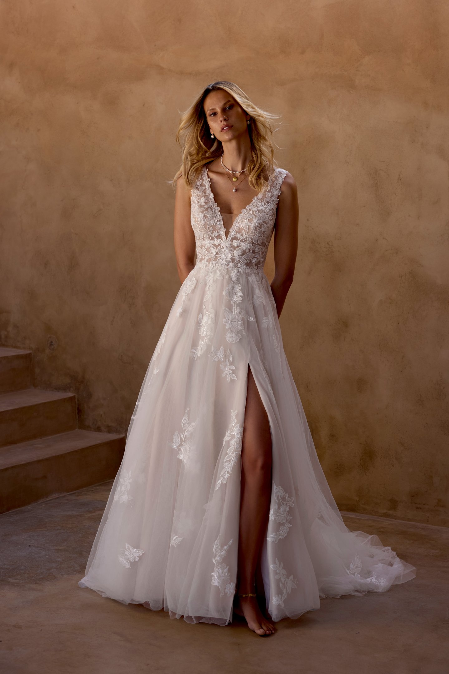 Lillian West Style 66464 Tulle A-Line Gown with Plunging Neckline and Sparkling Lace Appliqués