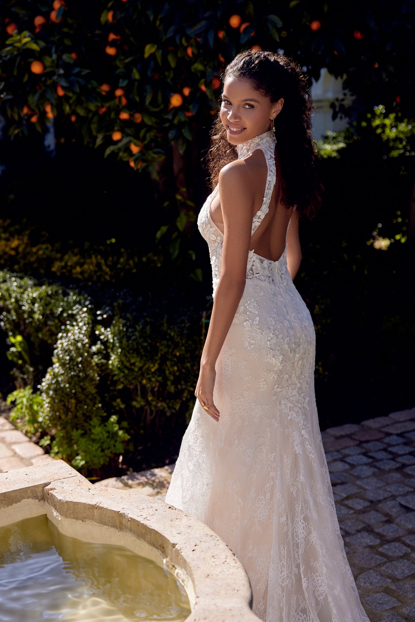 Lillian West Style 66424 Allover Lace Fit and Flare with High Neckline and Keyhole Back