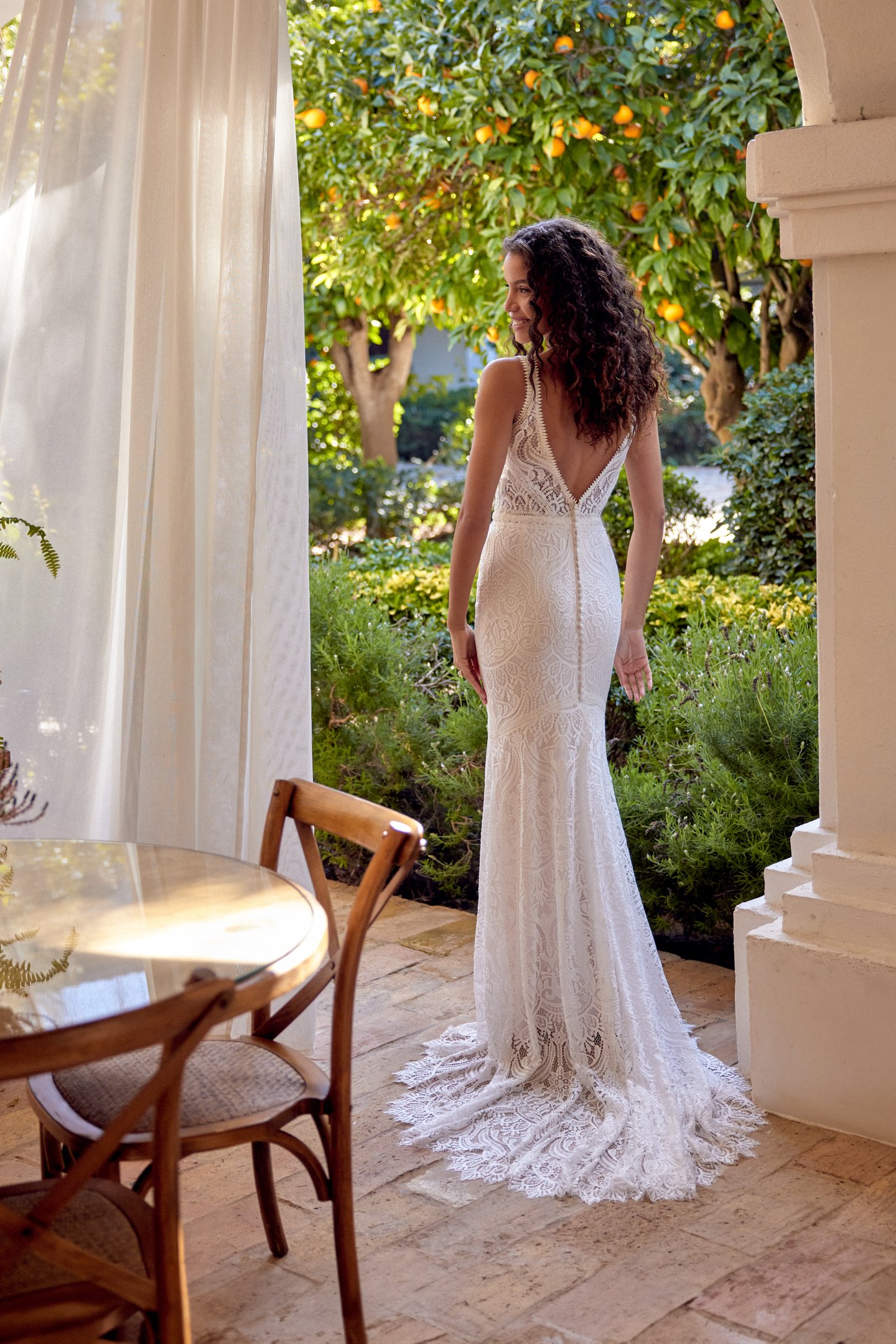 Lillian West Style 66426 Allover Matte Cotton Lace Fit and Flare Gown with Plunging V-Neckline