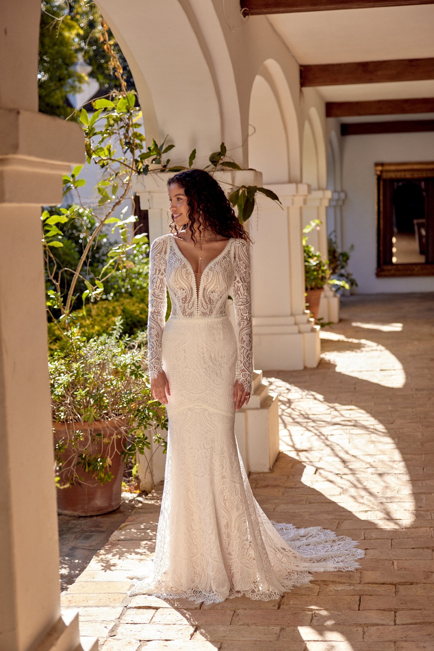 Lillian West Style 66426 Allover Matte Cotton Lace Fit and Flare Gown with Plunging V-Neckline