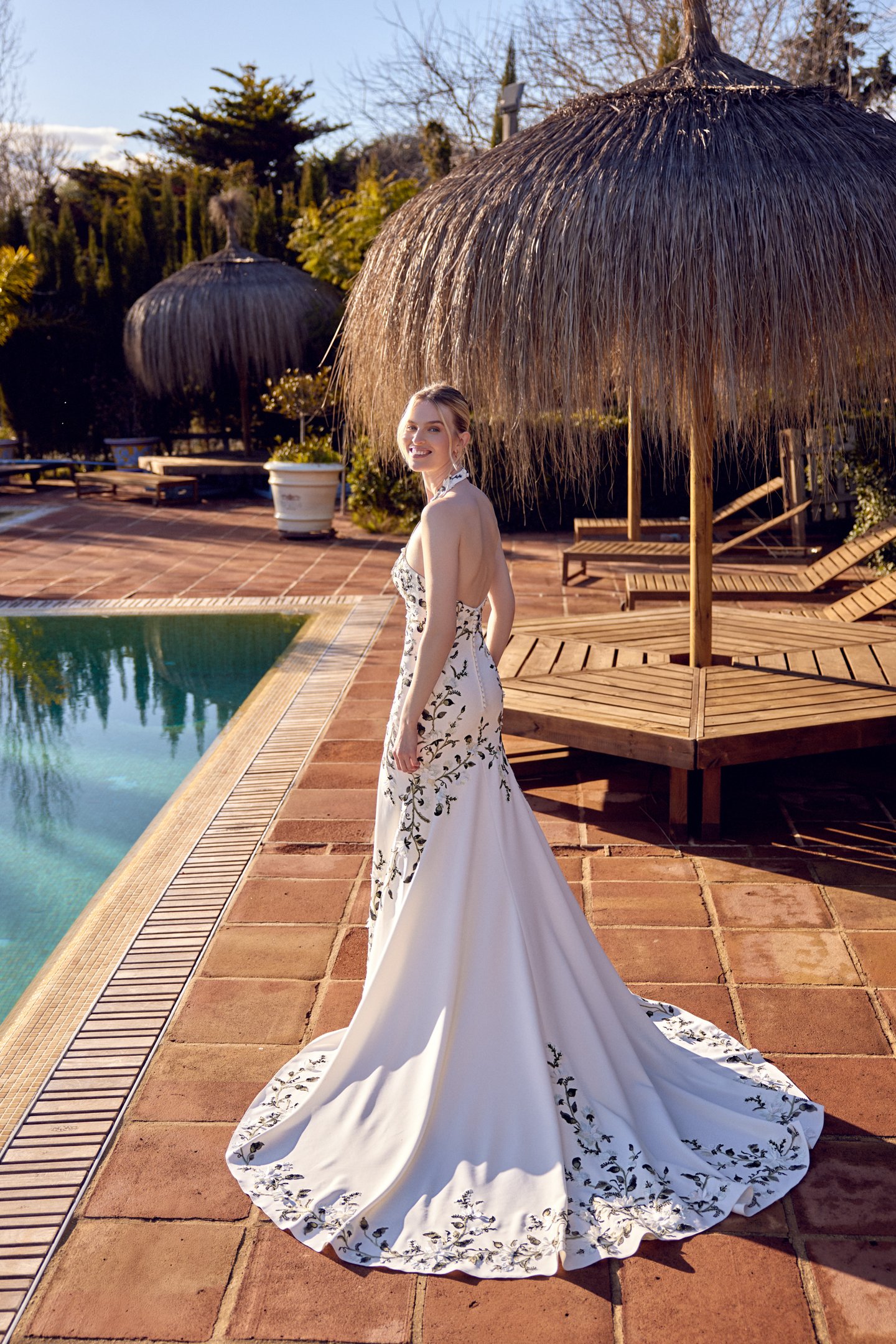 Lillian West Style 66436 Crepe Fit and Flare Gown with Halter Neckline and Green Appliqués