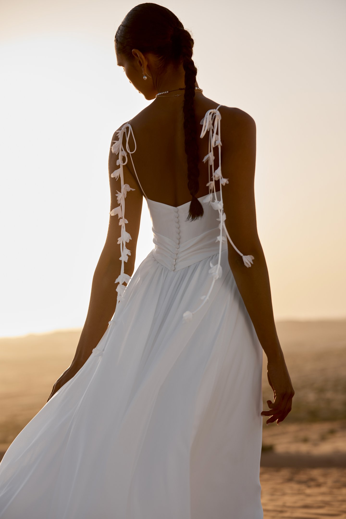 Lillian West Style 66472 A-Line Gown with Bikini Neckline, Crepe Bodice with Pleated Knot and Crepe Bows with Chiffon Petals