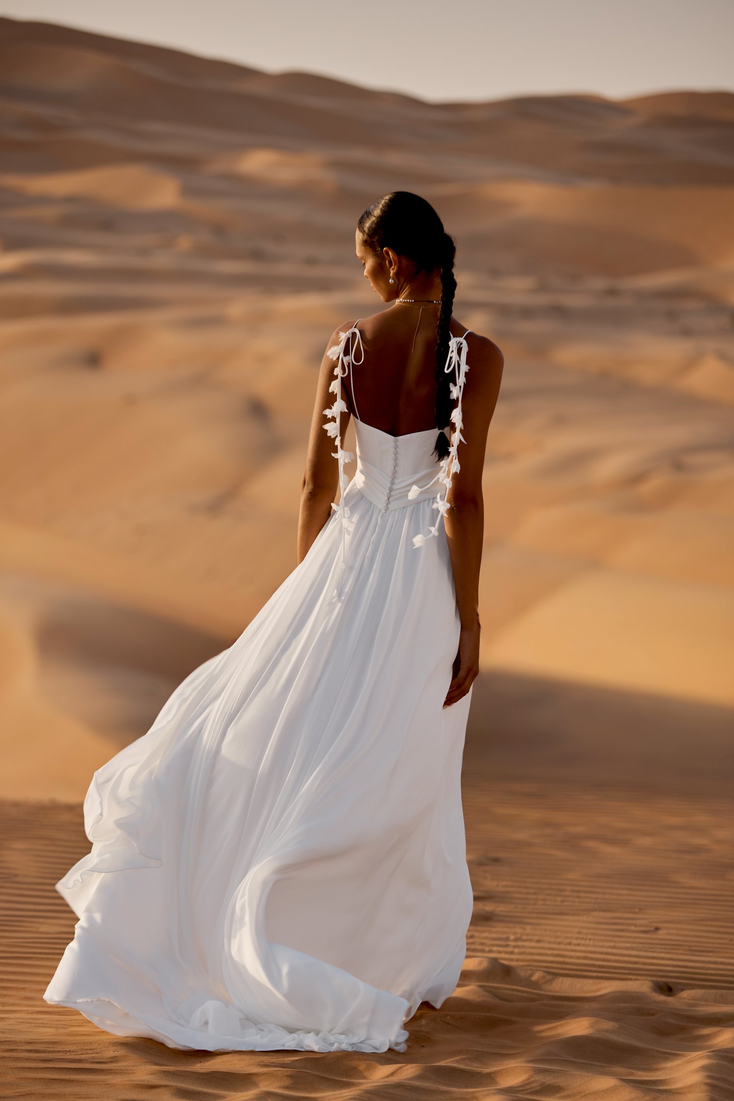 Lillian West Style 66472 A-Line Gown with Bikini Neckline, Crepe Bodice with Pleated Knot and Crepe Bows with Chiffon Petals
