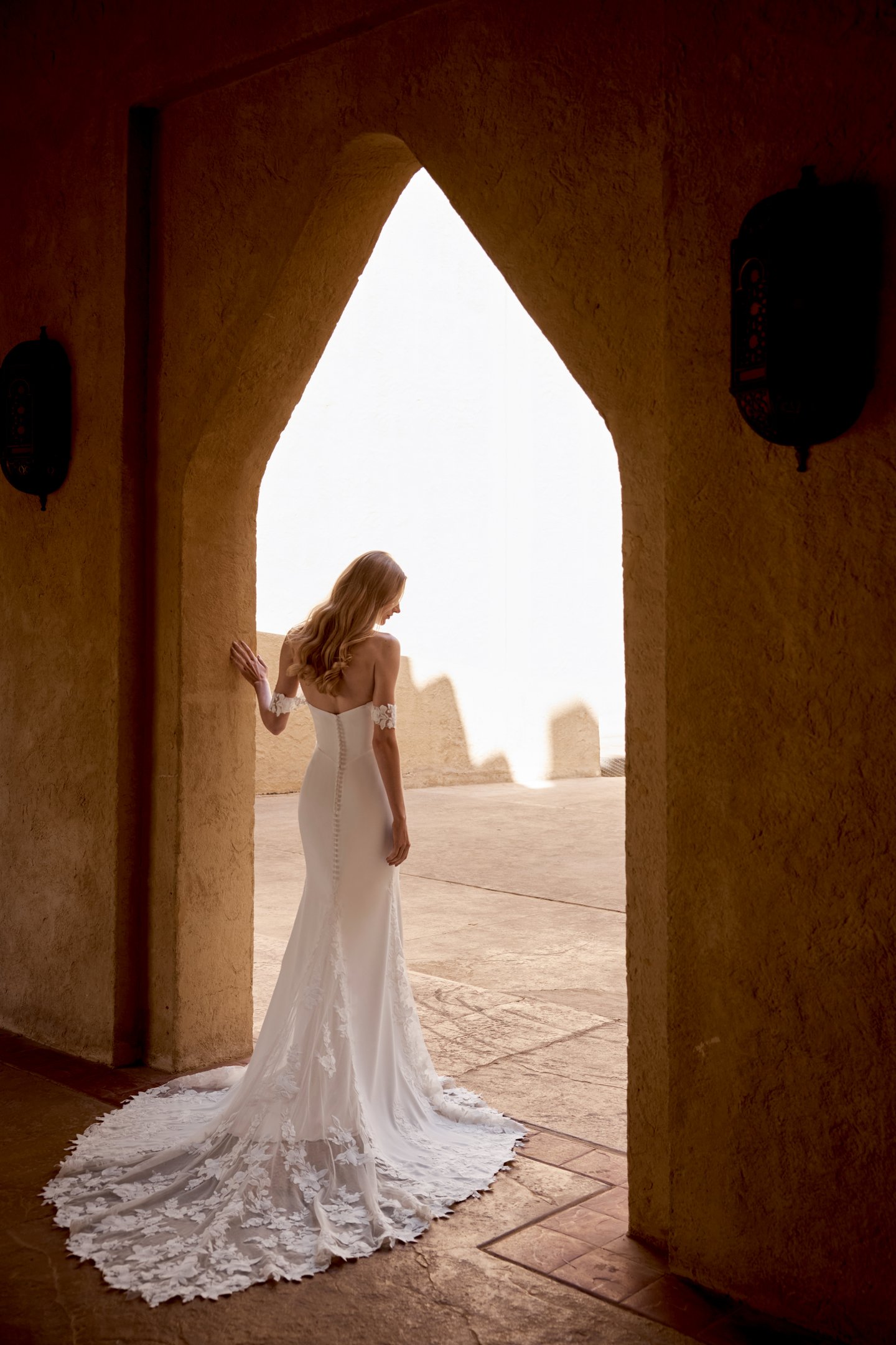 Lillian West Style 66475 Crepe Strapless Gown with Matte Lace Peek-A-Boo Detail on Neckline and Dramatic Chapel Length Train