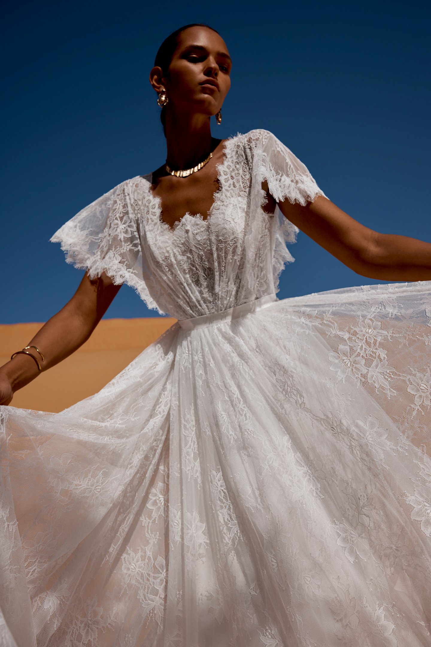 Lillian West Style 66495 Allover Lace A-Line Gown with Inverted Neckline and Flutter Sleeves