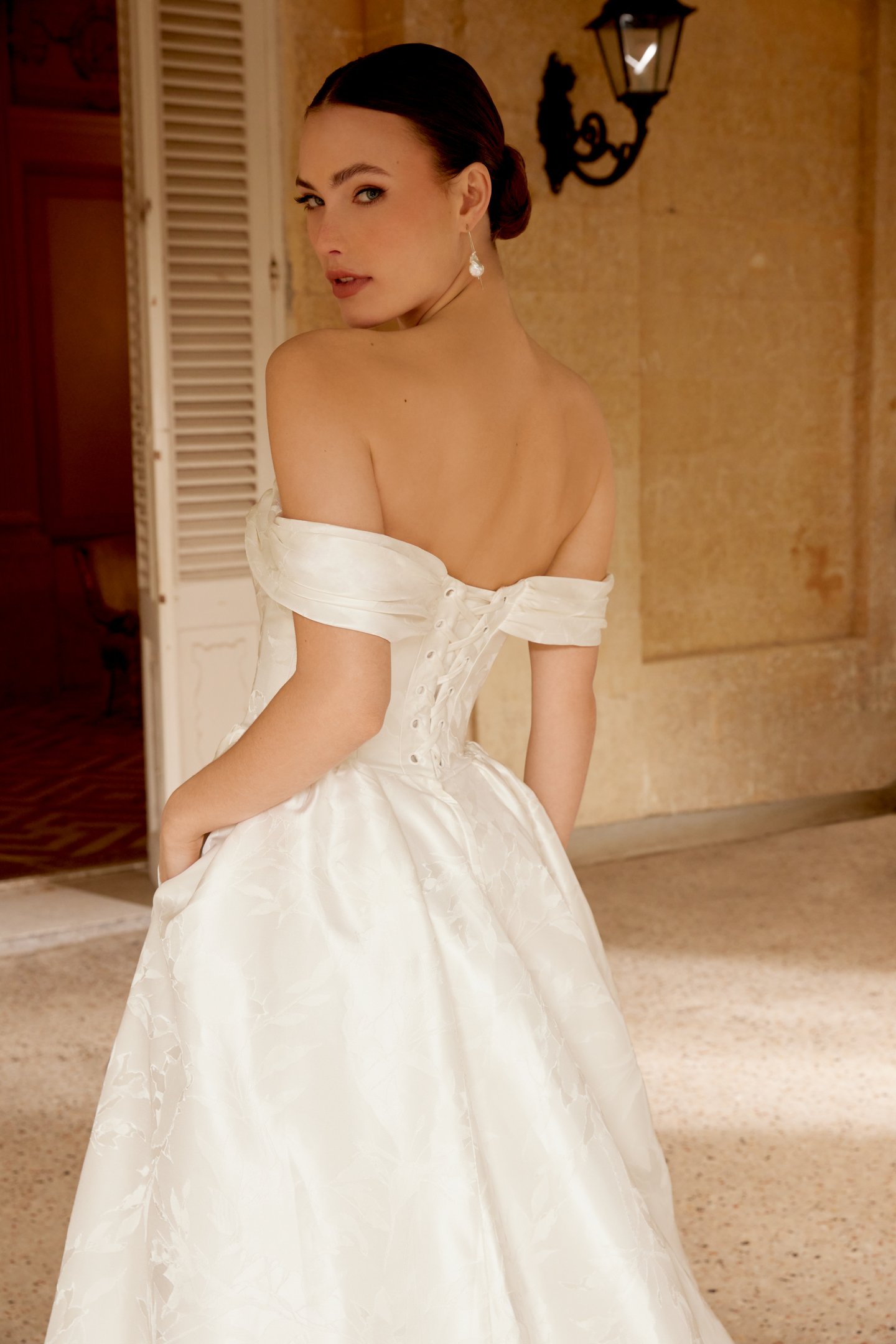 Sincerity Bridal Style 44601 Off-the-Shoulder Floral Brocade A-Line gown with Off-the-Shoulder Neckline and Princess Seams