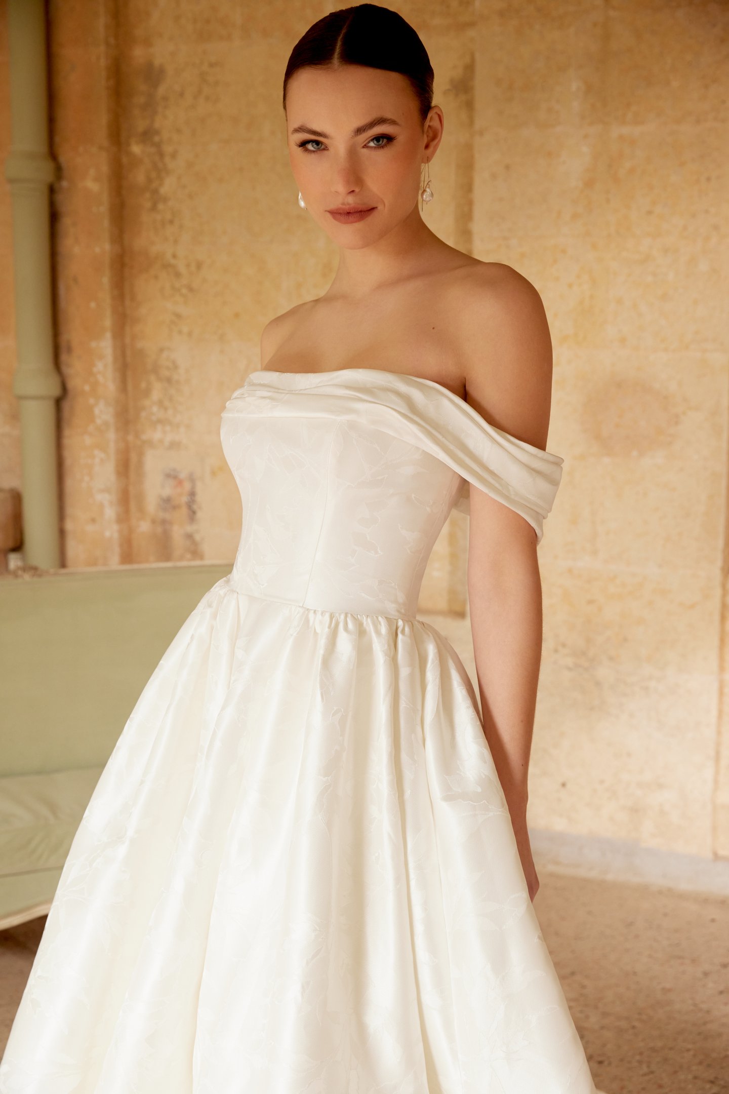 Sincerity Bridal Style 44601 Off-the-Shoulder Floral Brocade A-Line gown with Off-the-Shoulder Neckline and Princess Seams