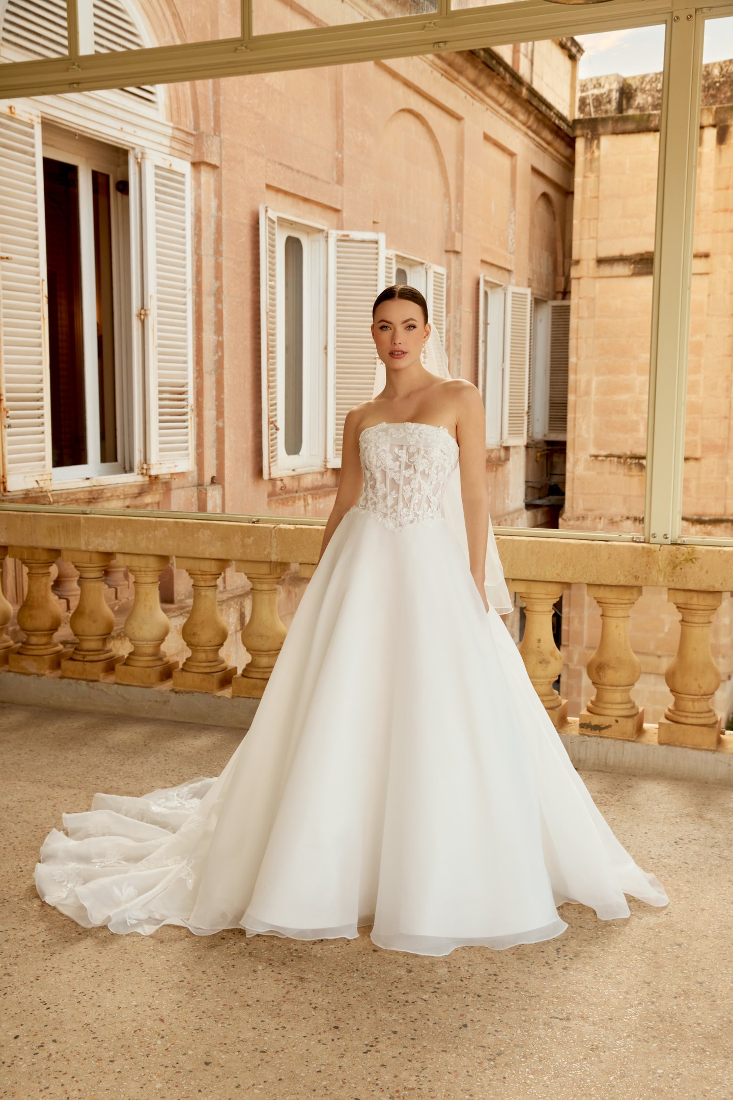 Sincerity Bridal Style 44604 Organza Ballgown with Illusion Bodice, Exposed Boning, and Lace Appliqués on the Circular Skirt and Train