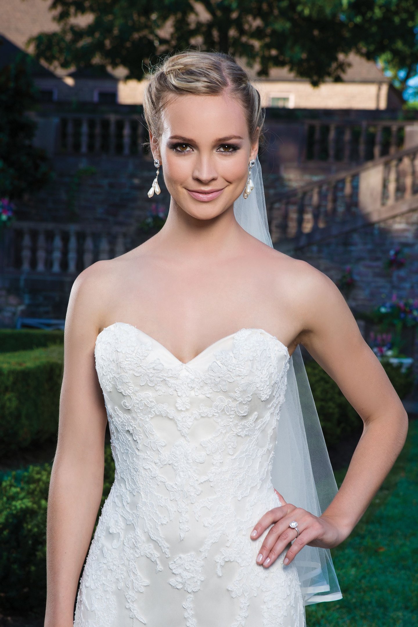 Sincerity Bridal Style 3859 Alencon Lace and tulle fit and flare featuring a sweetheart neckline.