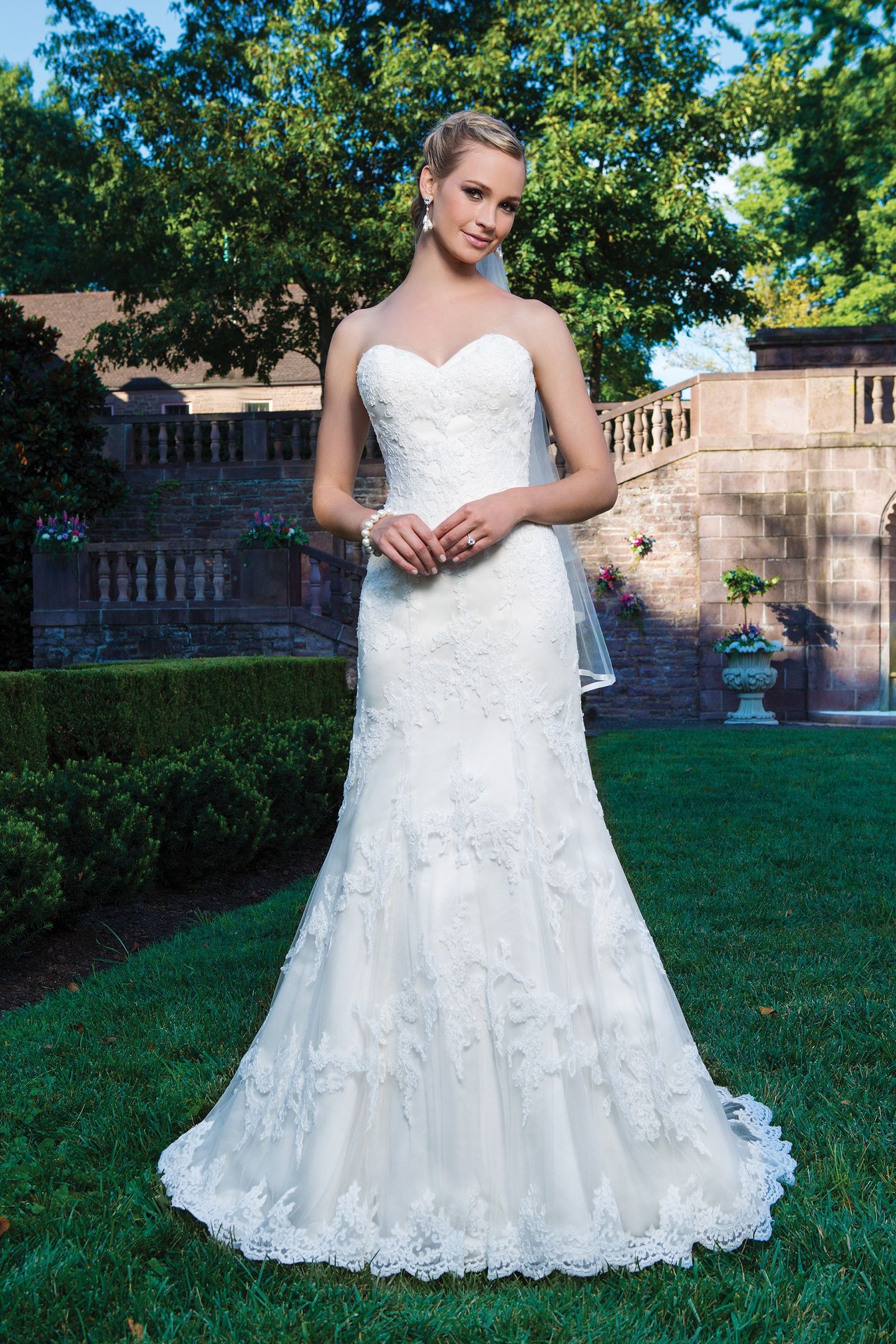 Sincerity Bridal Style 3859 Alencon Lace and tulle fit and flare featuring a sweetheart neckline.