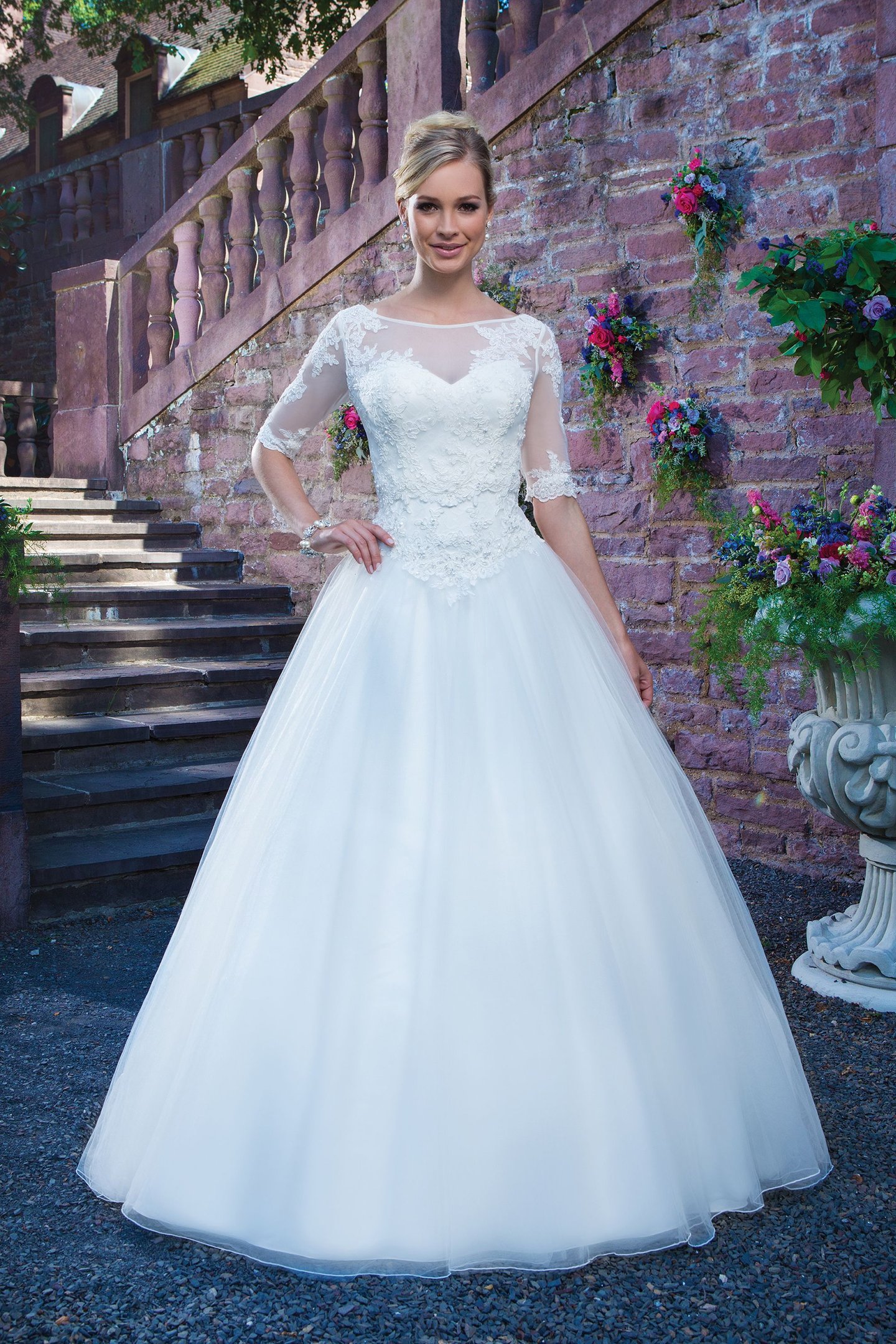 Sincerity Bridal Style 3870 Beaded embroidered lace; alencon lace and tulle ball gown accentuated by a sweetheart neckline.
