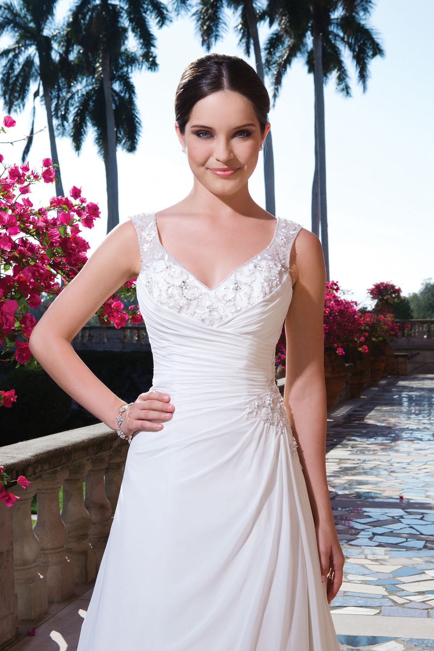 Sweetheart Gowns Style 6060 Chiffon A-line dress complemented with a V-neck