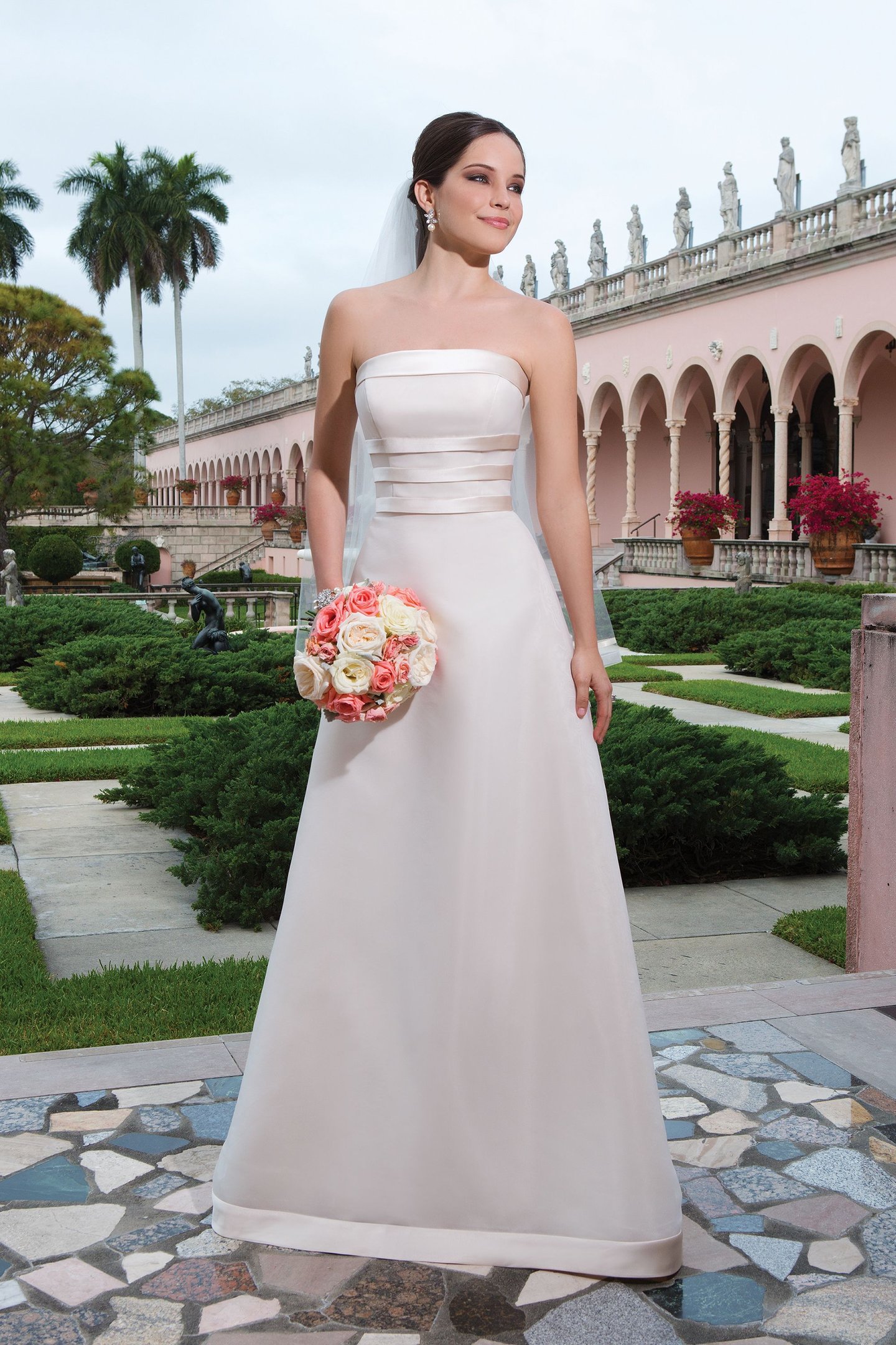 Sweetheart Gowns Style 6062 Regal satin, heavy organza A-line dress featuring a strapless neckline