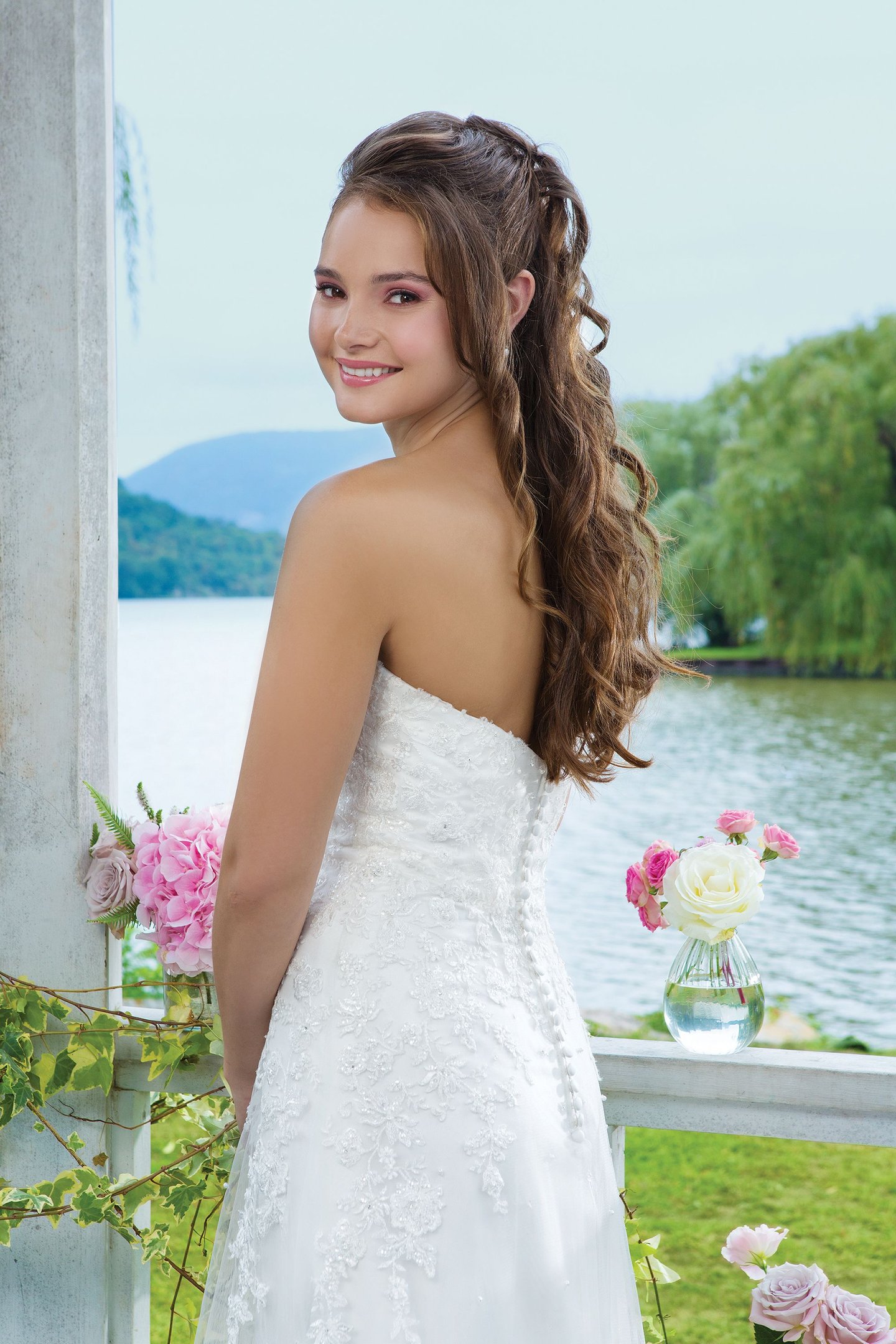 Sweetheart Gowns Style 6096 Beaded emboridered lace and tulle Slim A-line accentuated by a sweetheart neckline.