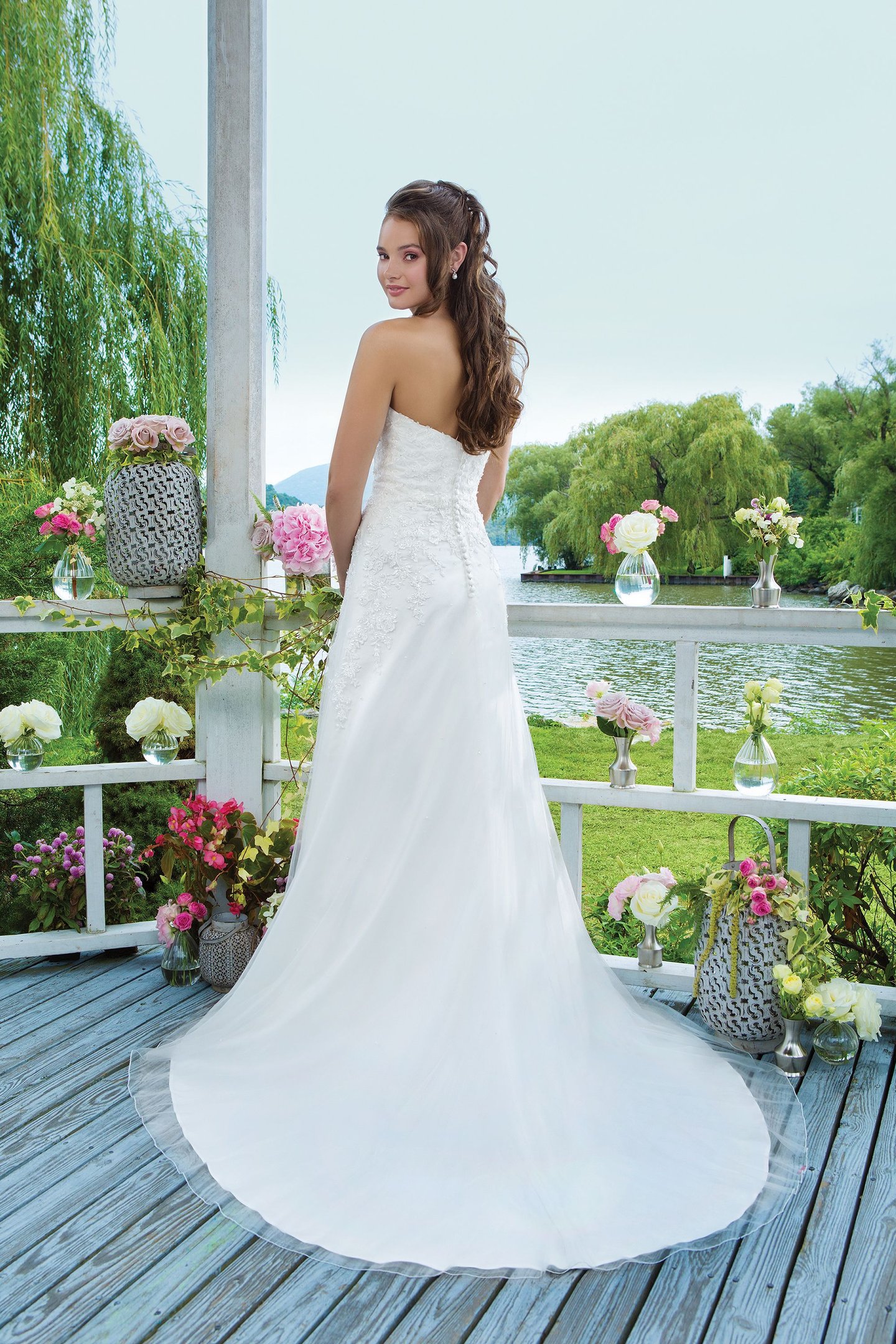 Sweetheart Gowns Style 6096 Beaded emboridered lace and tulle Slim A-line accentuated by a sweetheart neckline.