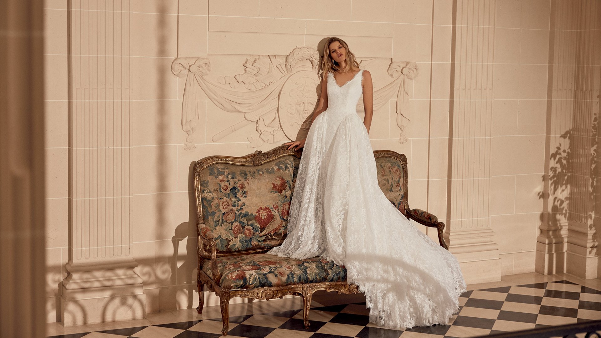 Justin Alexander Style 88543 Natalina Matte Allover Lace Ball Gown with V-Neckline and Dramatic Waterfall Waistline with Detachable Hip Puffs