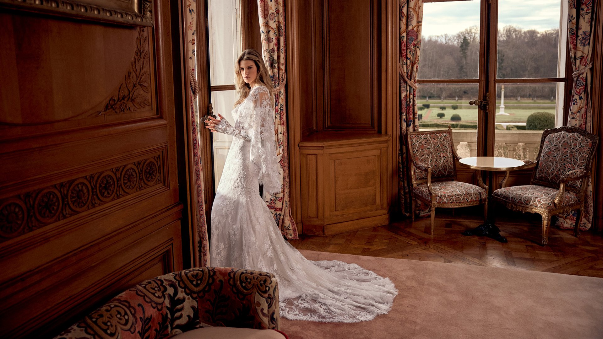 Justin Alexander Style 88561 Nicoletta Allover Corded Lace Fit and Flare Gown with Long Sleeves and Sheer Bodice with Demicups