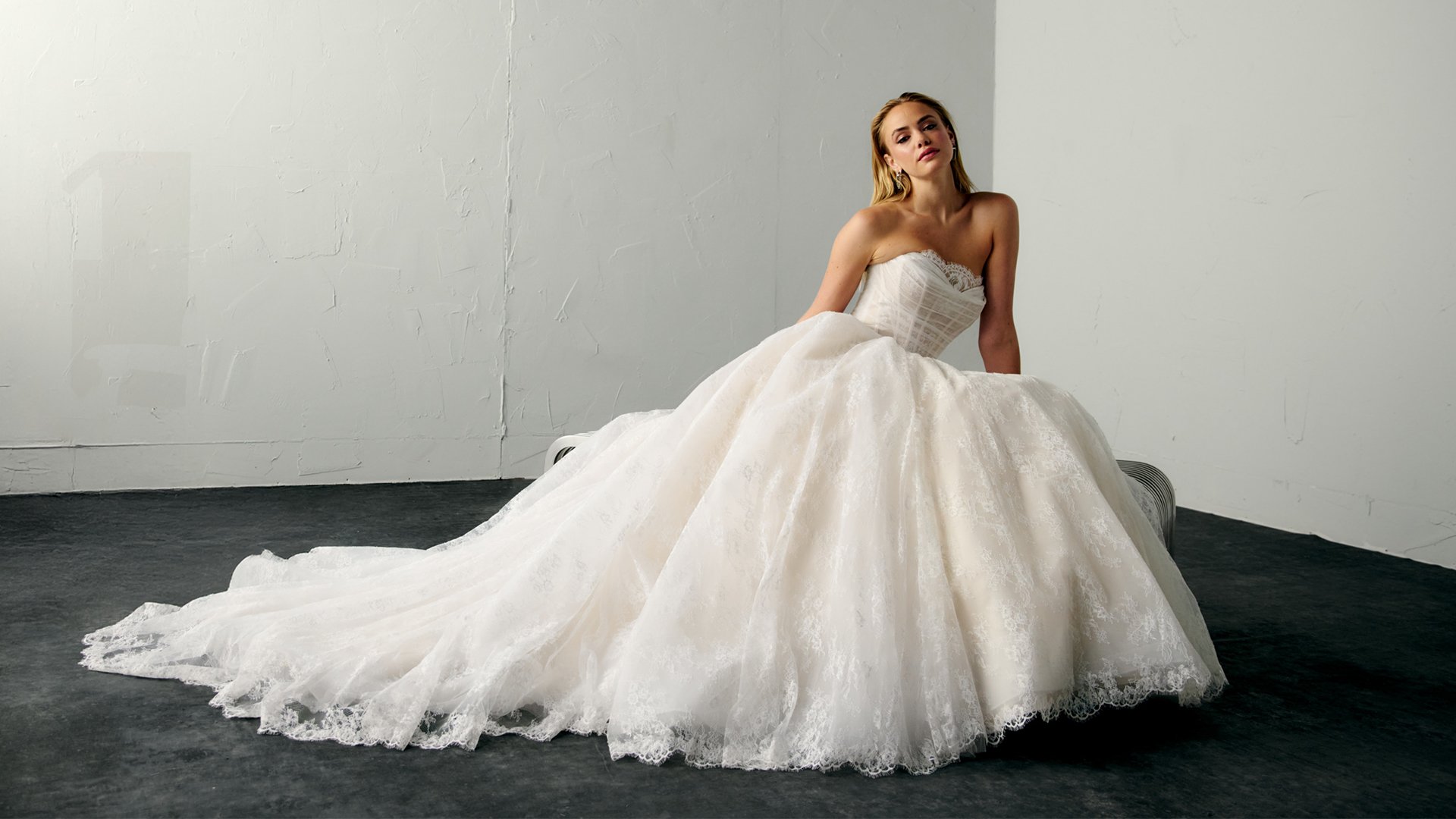 Justin Alexander Signature Style 99392 ERIS Chantilly Lace Ball Gown with Peek-a-Boo Neckline and Basque Waist