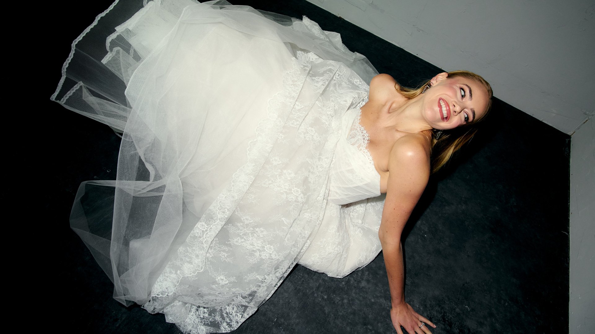 Justin Alexander Signature Style 99392 ERIS Chantilly Lace Ball Gown with Peek-a-Boo Neckline and Basque Waist