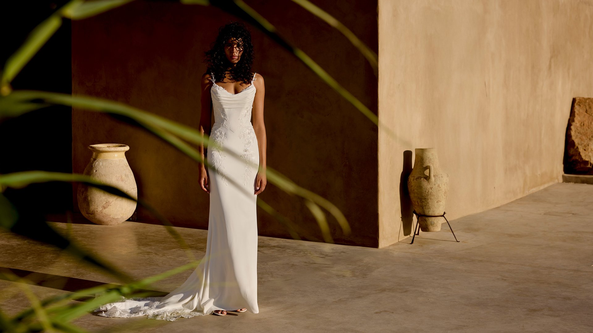 Lillian West Style 66447 Crepe Fit & Flare Gown with Draped Bikini Neckline and Lace Appliqués
