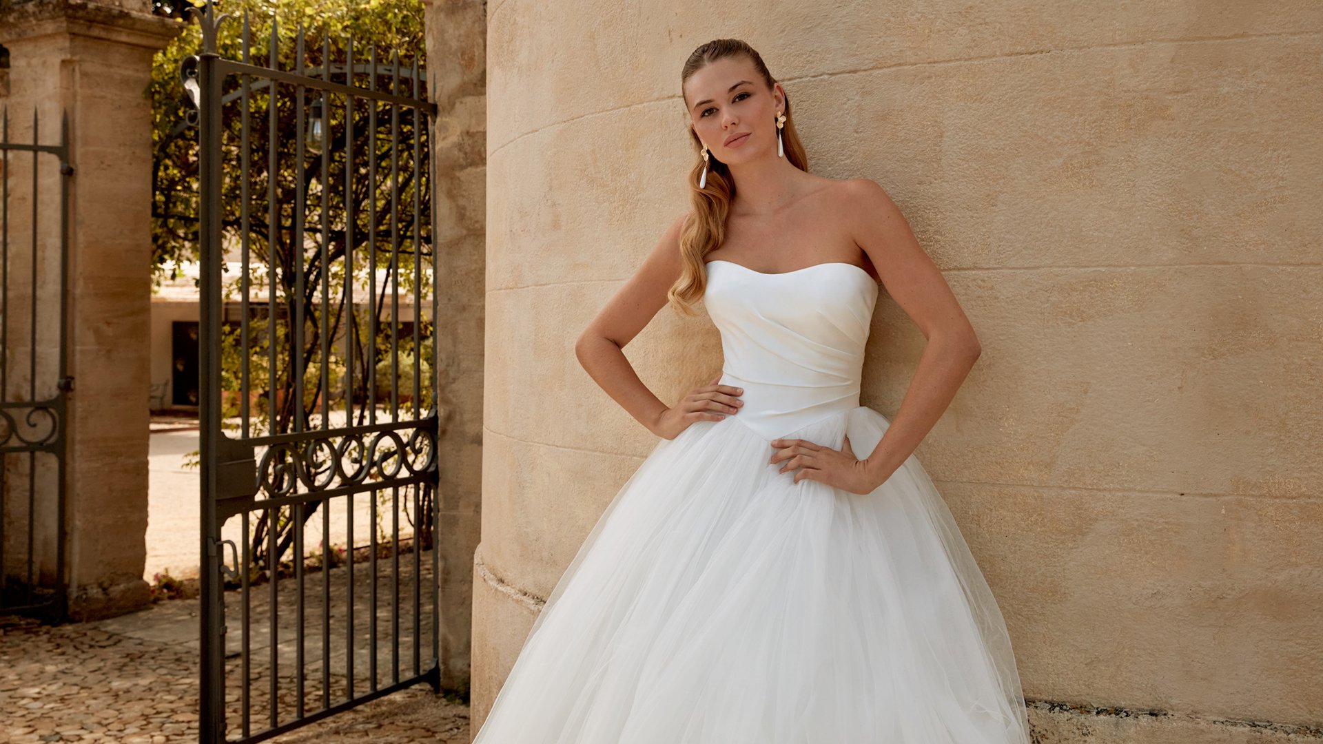 Sincerity Bridal Style 44579 Strapless Tulle Ball Gown with Draped Satin Basque Waist Bodice