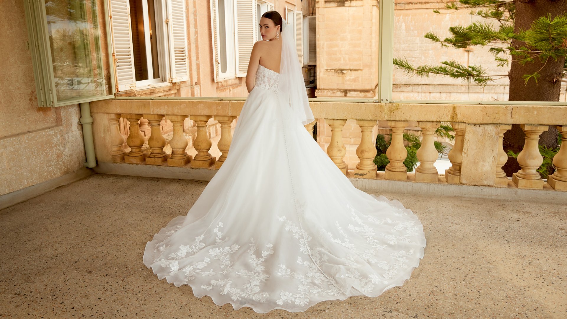 Sincerity Bridal Style 44604 Organza Ballgown with Illusion Bodice, Exposed Boning, and Lace Appliqués on the Circular Skirt and Train