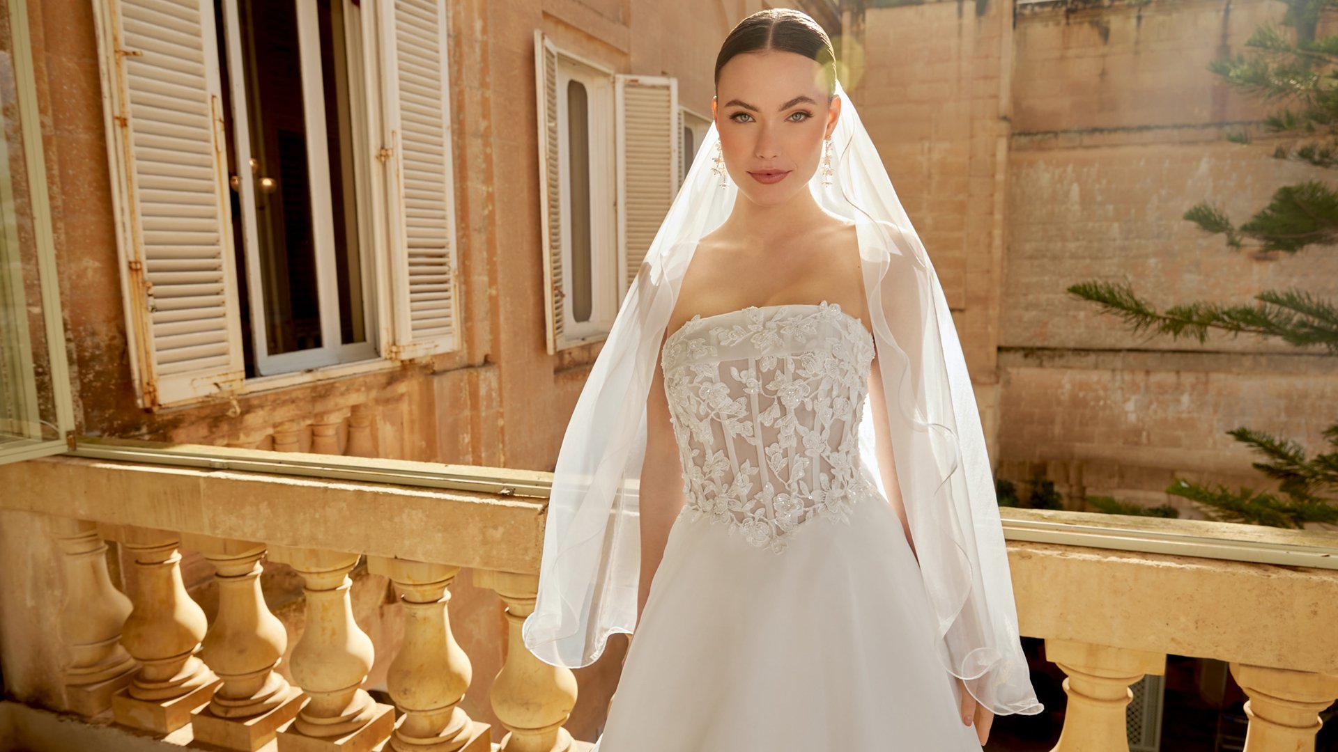 Sincerity Bridal Style 44604 Organza Ballgown with Illusion Bodice, Exposed Boning, and Lace Appliqués on the Circular Skirt and Train
