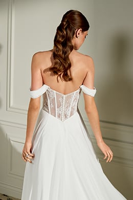 Adore by Justin Alexander Style 11460 Rosemary Chiffon A-Line Bridal Gown with Peek-A-Boo Lace at Strapless Cowl Neckline, Sheer Bodice, and Basque Waistline