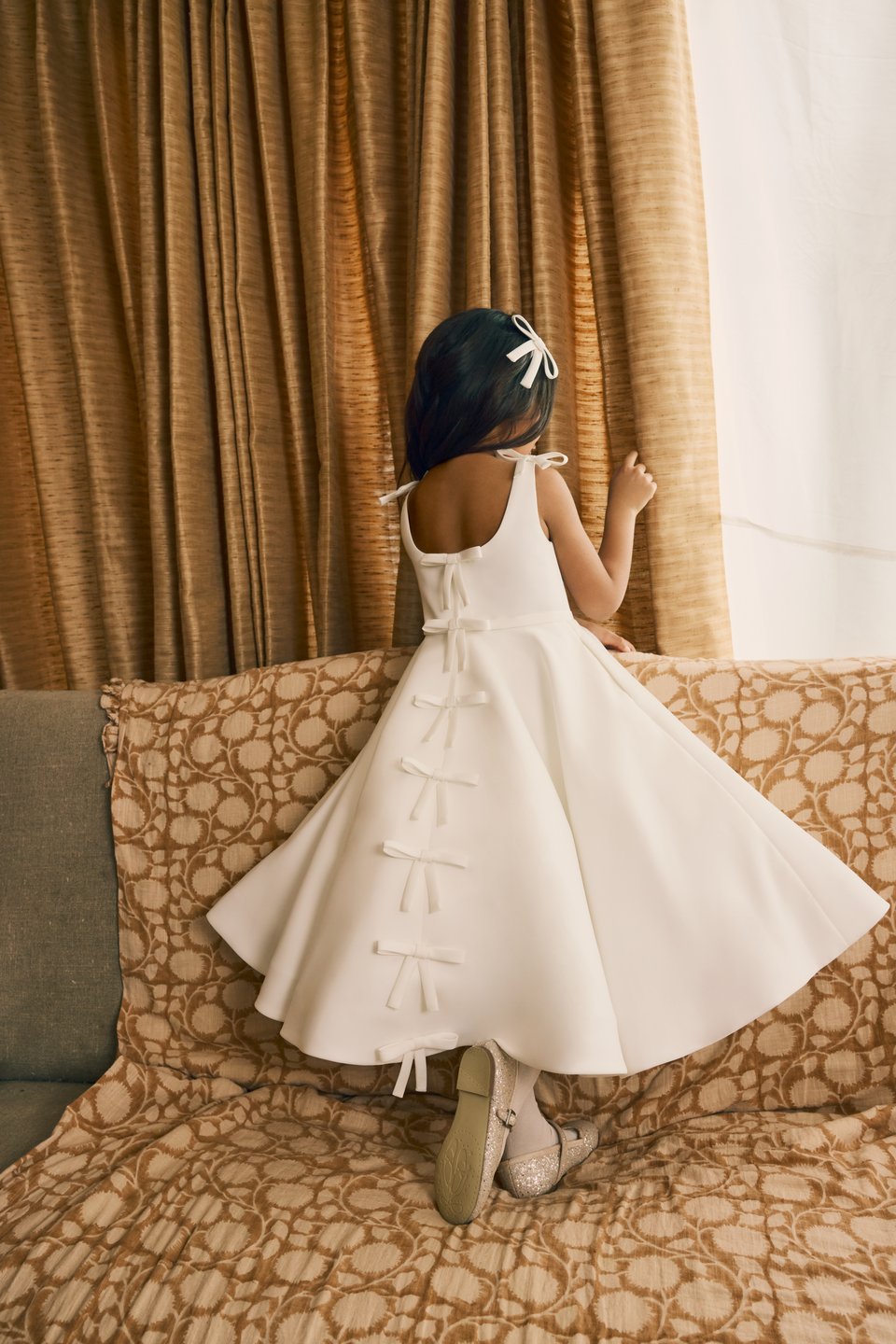 Fable by Justin Alexander Style FG003 Avel Tea Length Satin A-Line Dress with Matching Satin Bows on Shoulders  and Back