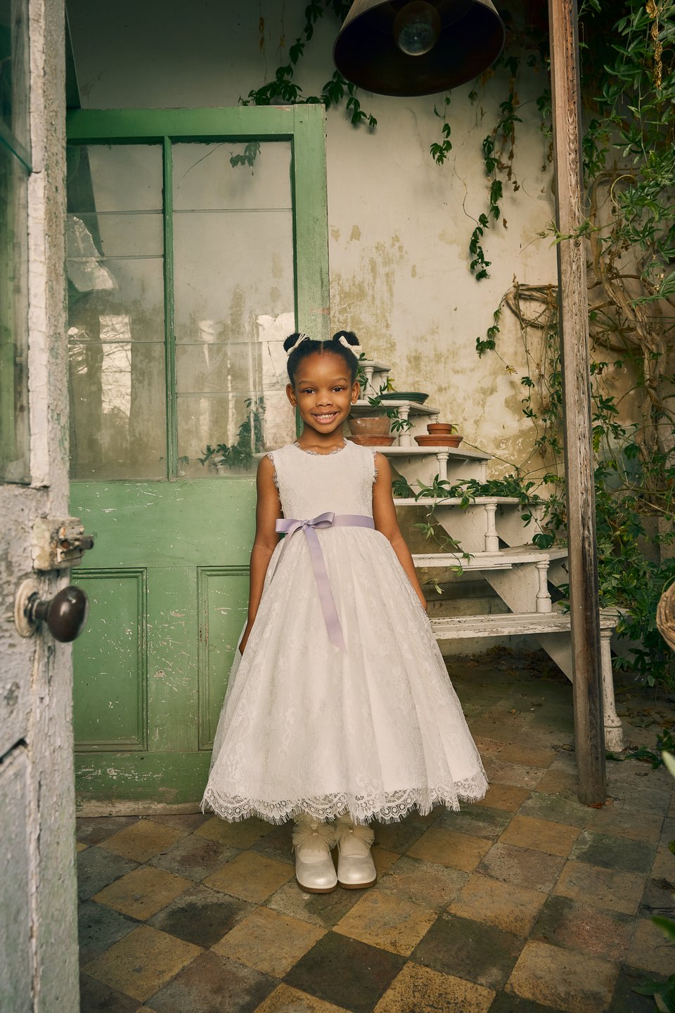 Fable by Justin Alexander Style FG007 Blossom Chantilly Lace Tea Length A-Line Dress with Illusion Back and Eyelash Trim at Neckline and Hem