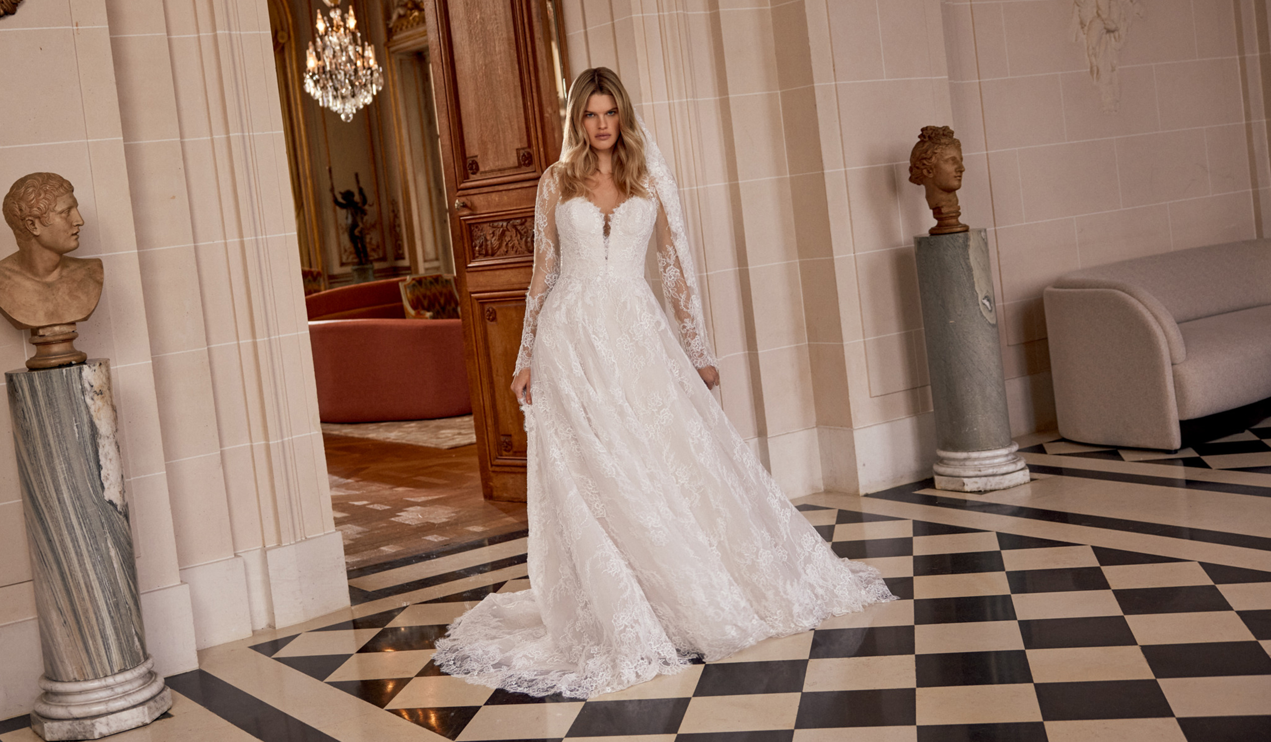 Justin Alexander Style 88557 Nela Allover Alençon Corded Lace A-Line Gown with Plunging Queen Anne Neckline and Illusion Keyhole Back
