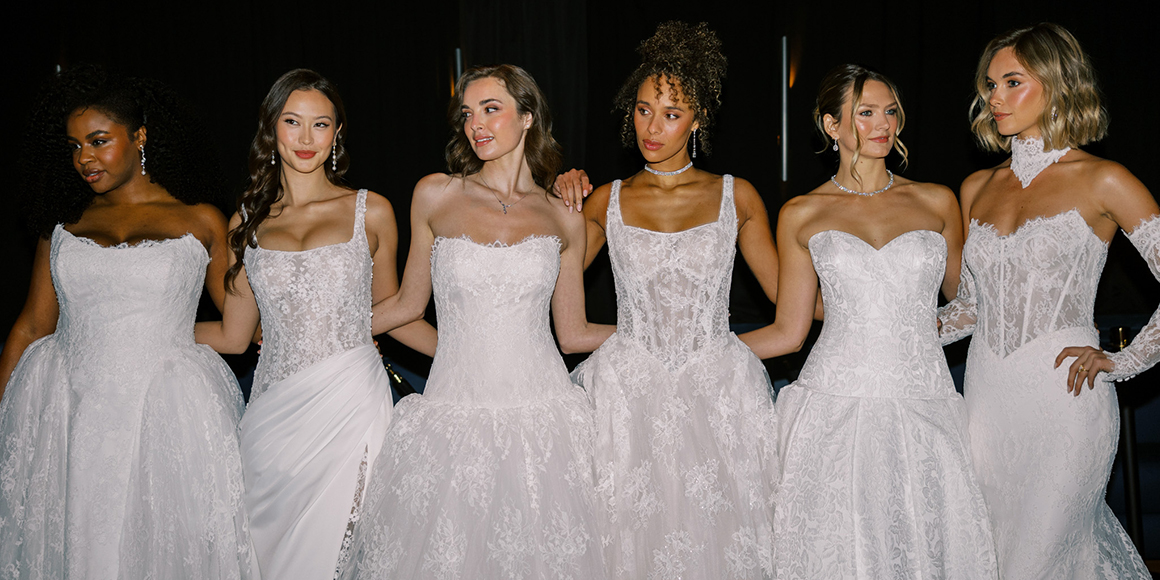 Justin Alexander Signature FW27 Crescendo models gathered for the final group shot at So & So's piano bar during New York Bridal Fashion Week