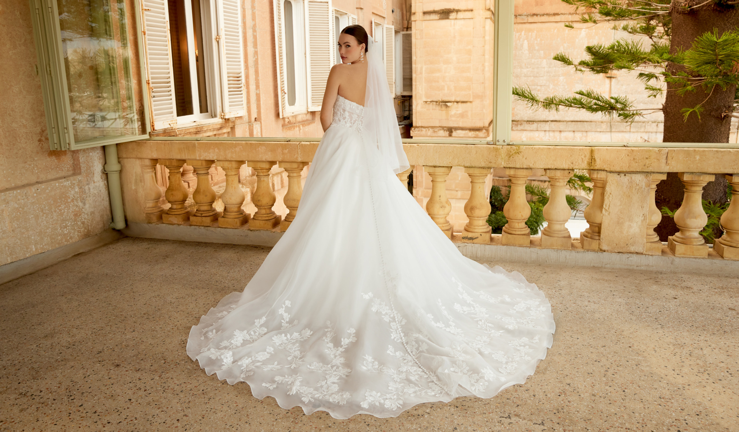 Sincerity Bridal Style 44604 Organza Ballgown with Illusion Bodice, Exposed Boning, and Lace Appliqués on the Circular Skirt and Train