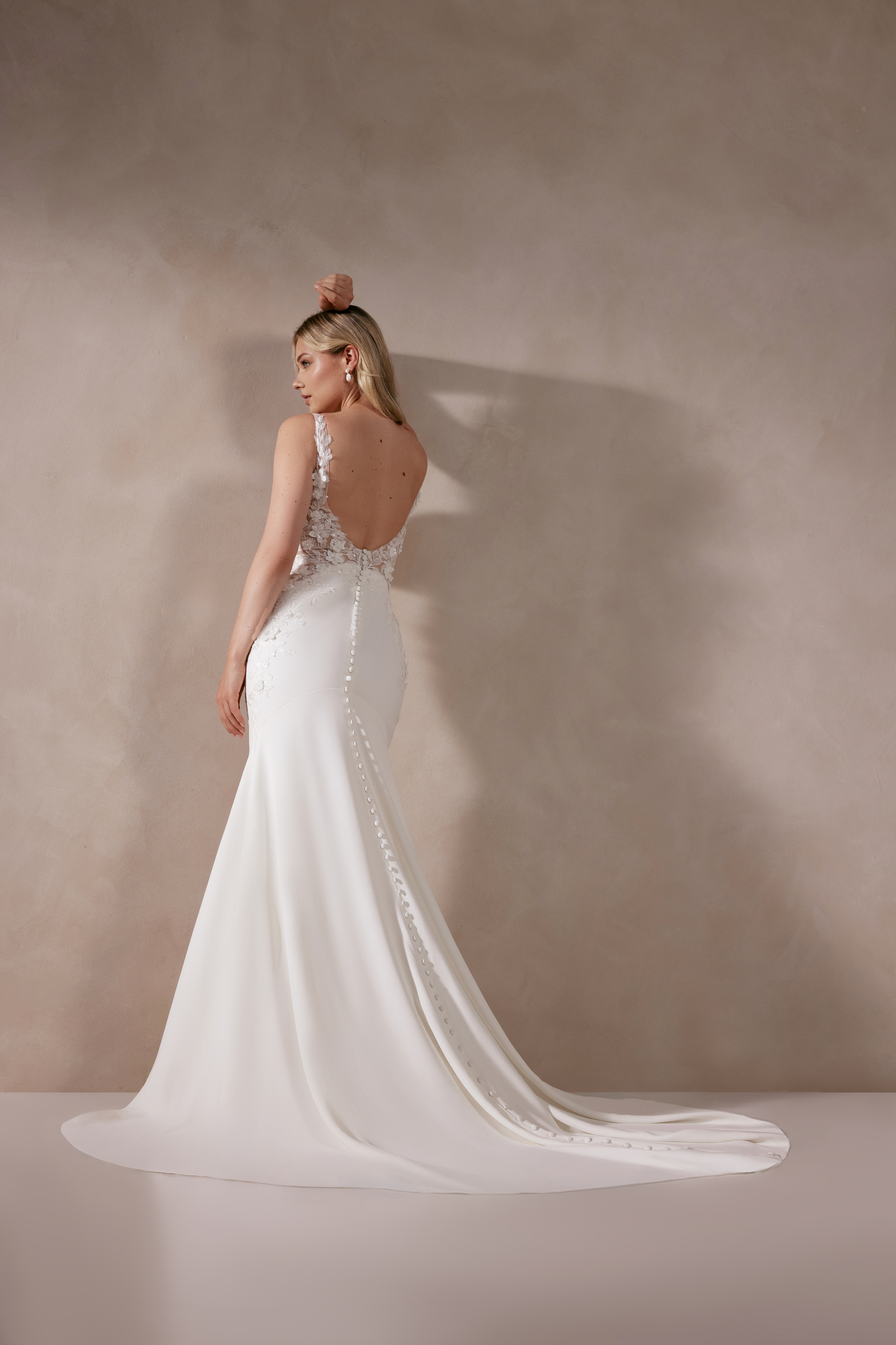 Adore by Justin Alexander Style 11390 Yelena Crepe Fit and Flare Gown with V-Neckline and Embroidered Lace