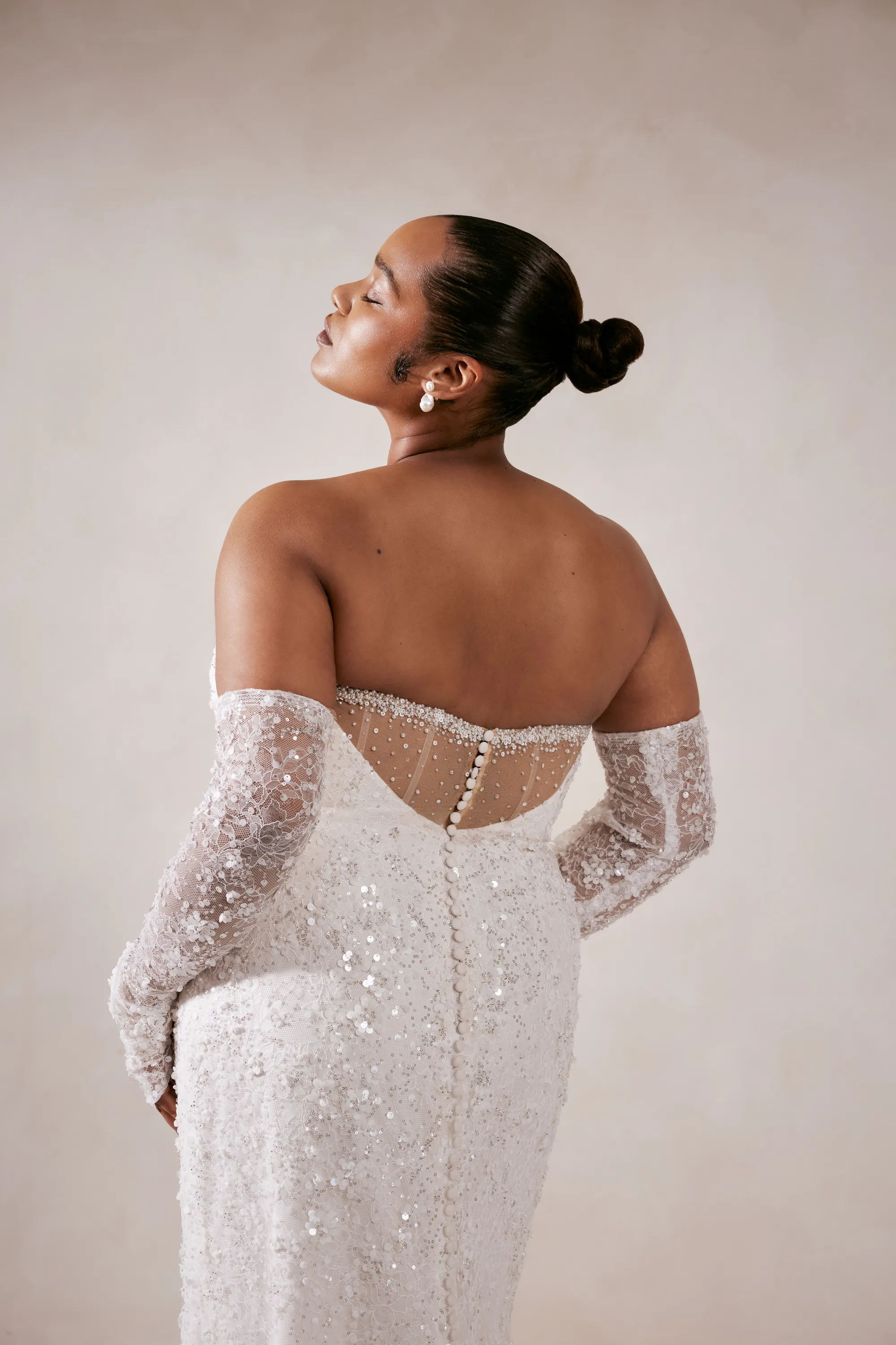 Phoenix: Strapless Allover Beaded Fit and Flare Wedding Gown