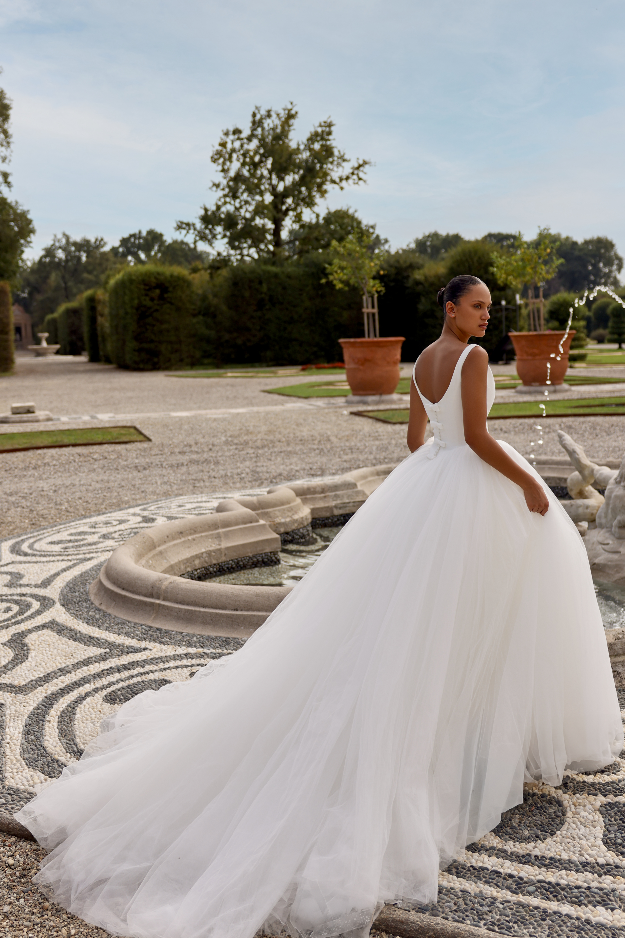 Justin Alexander Style 88444 Tulle Ball Gown with Basque Waistline and Bow Accents
