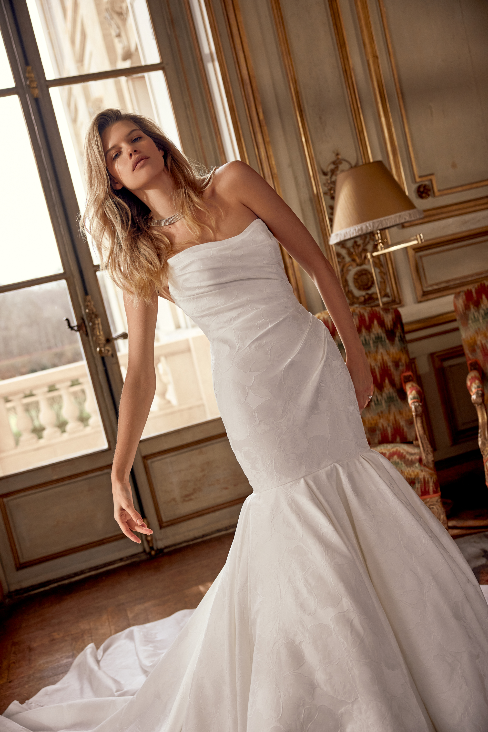 Justin Alexander Style 88536 Nori Brocade Trumpet Gown with Asymmetrical Ruching on Bodice and Dramatic Mermaid Skirt